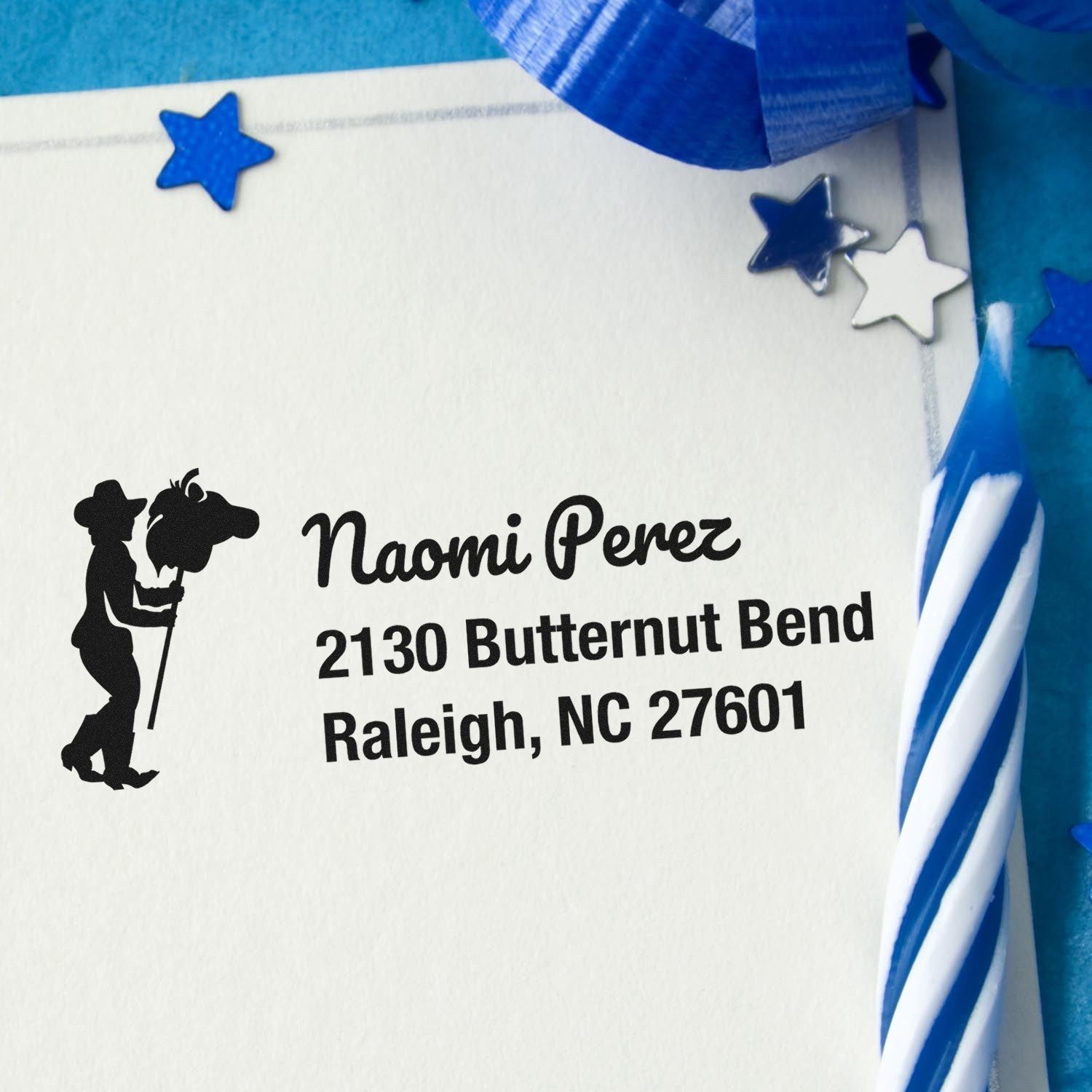 Personalized rubber return address stamp for Naomi Perez, Raleigh NC, with decorative stars for envelopes and mailings.