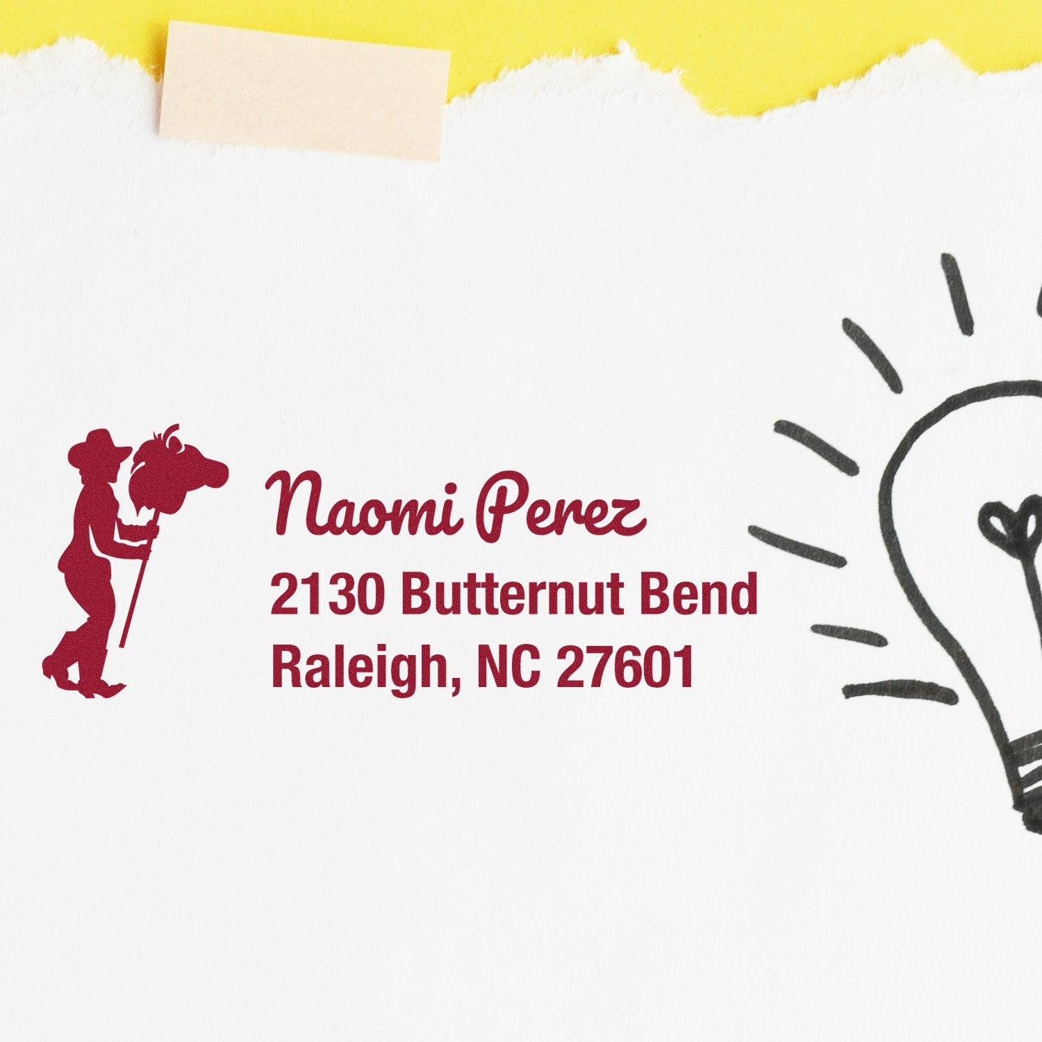 Personalized return address rubber stamp with golfer design for Naomi Perez, Raleigh, NC 27601.