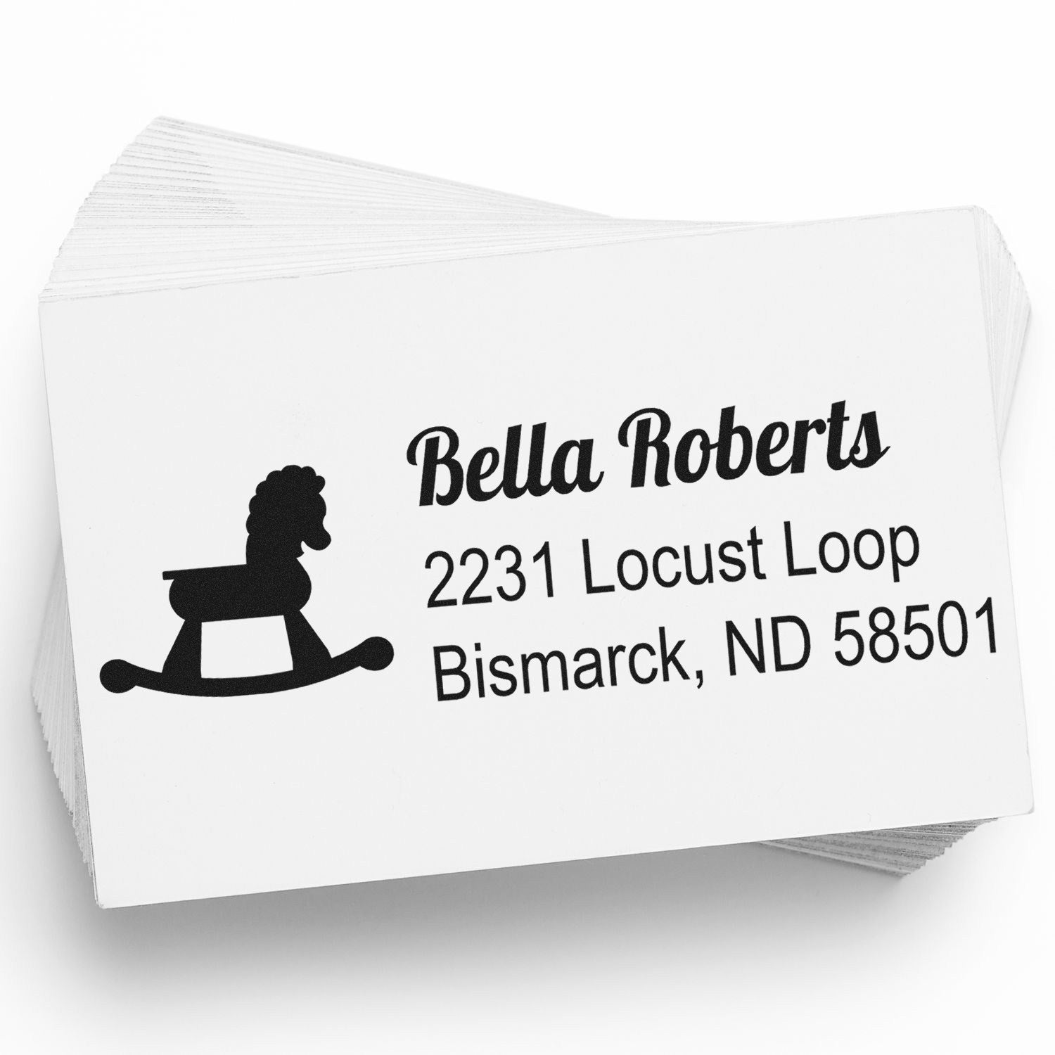 Personalized return address rubber stamp with rocking horse icon for Bella Roberts, 2231 Locust Loop, Bismarck, ND 58501.