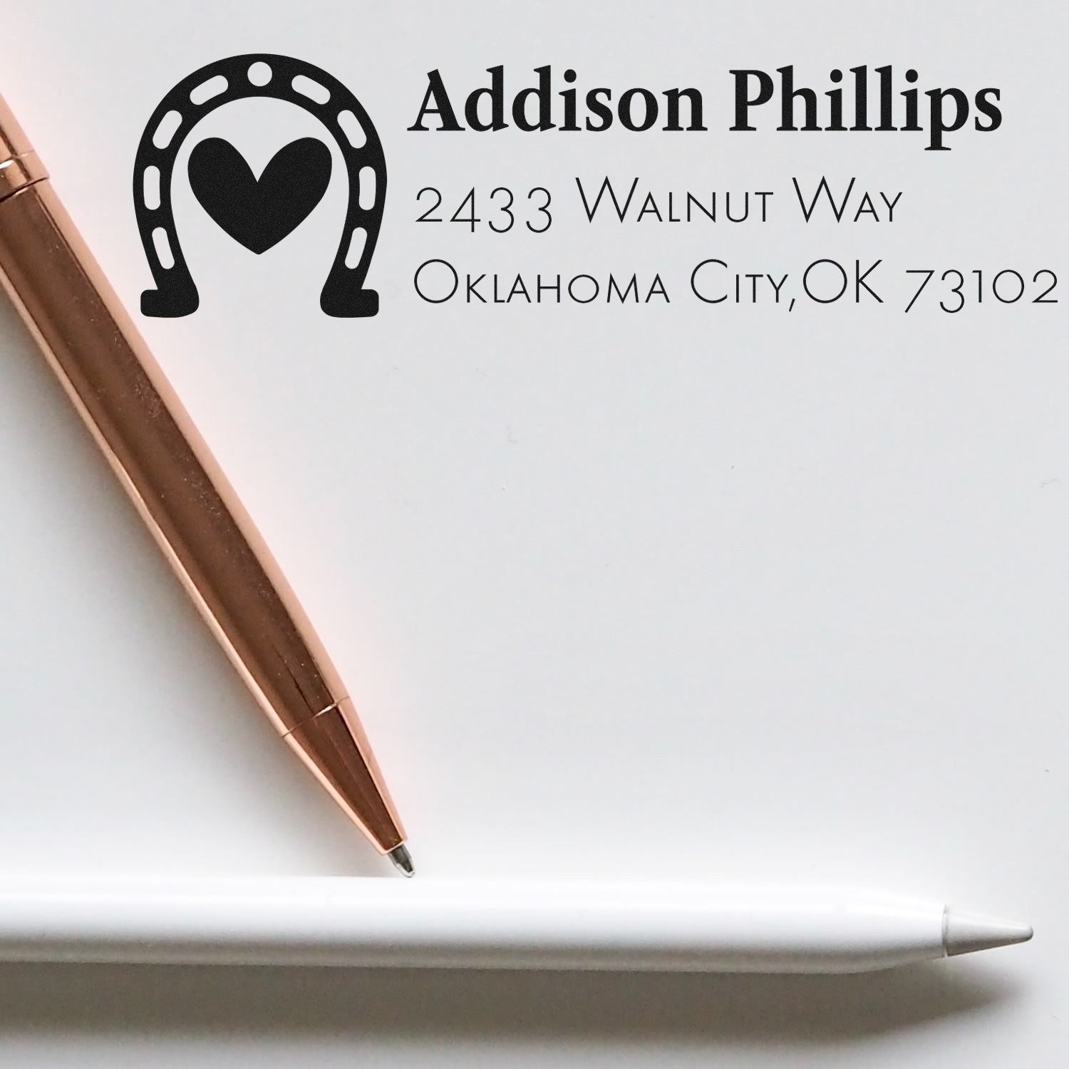 Custom return address rubber stamp with horseshoe heart design, Addison Phillips, Oklahoma City, OK 73102.