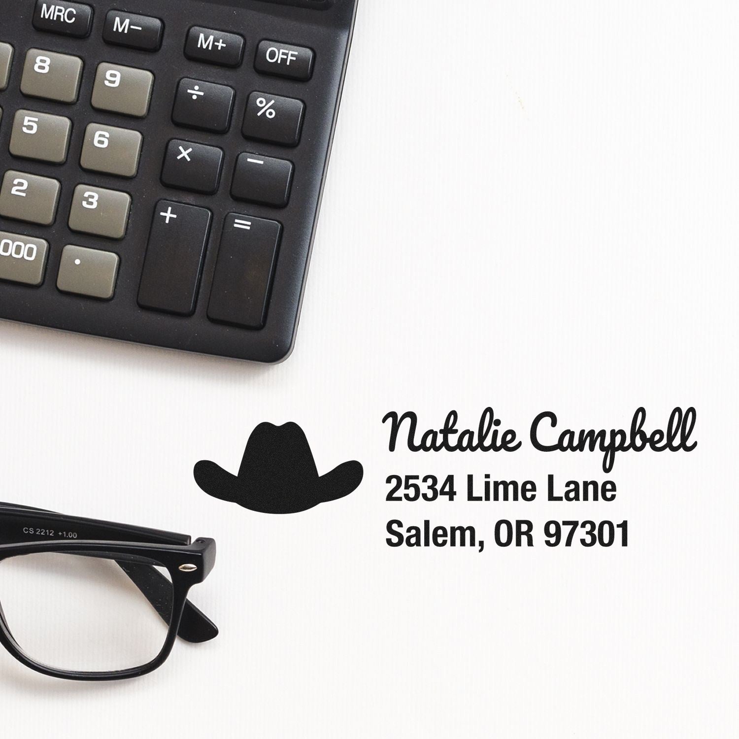 Custom return address rubber stamp with cowboy hat design, featuring Natalie Campbell name and Salem, OR address.
