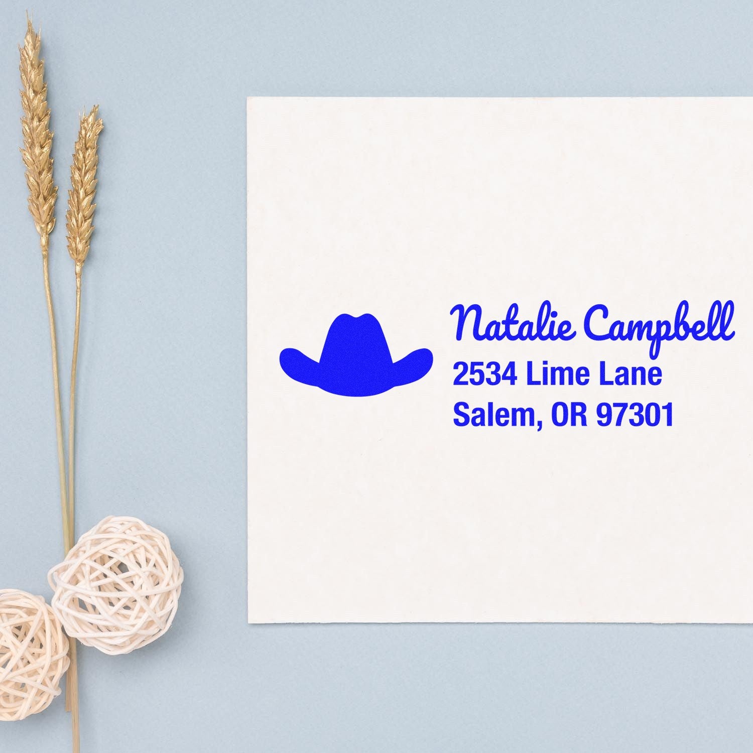 Custom return address rubber stamp with cowboy hat icon for Natalie Campbell, Salem, OR 97301
