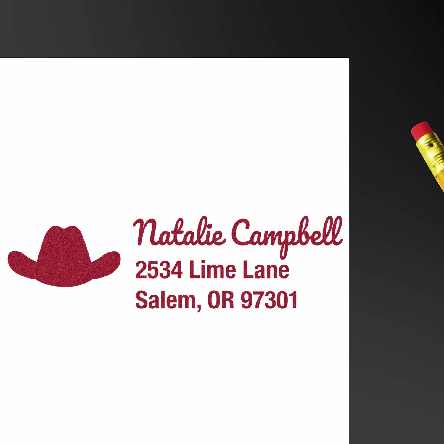 Custom address rubber stamp with cowboy hat icon for Natalie Campbell, 2534 Lime Lane, Salem, OR 97301.