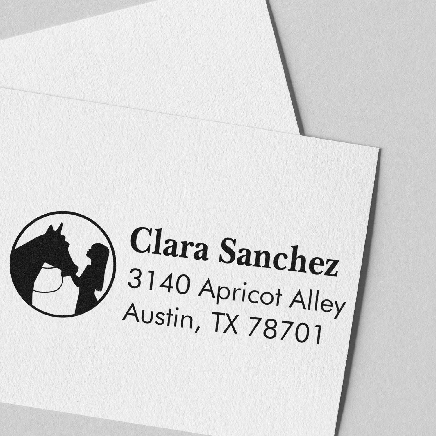 Custom rubber address stamp with horse logo for Clara Sanchez, Austin, TX mailing correspondence