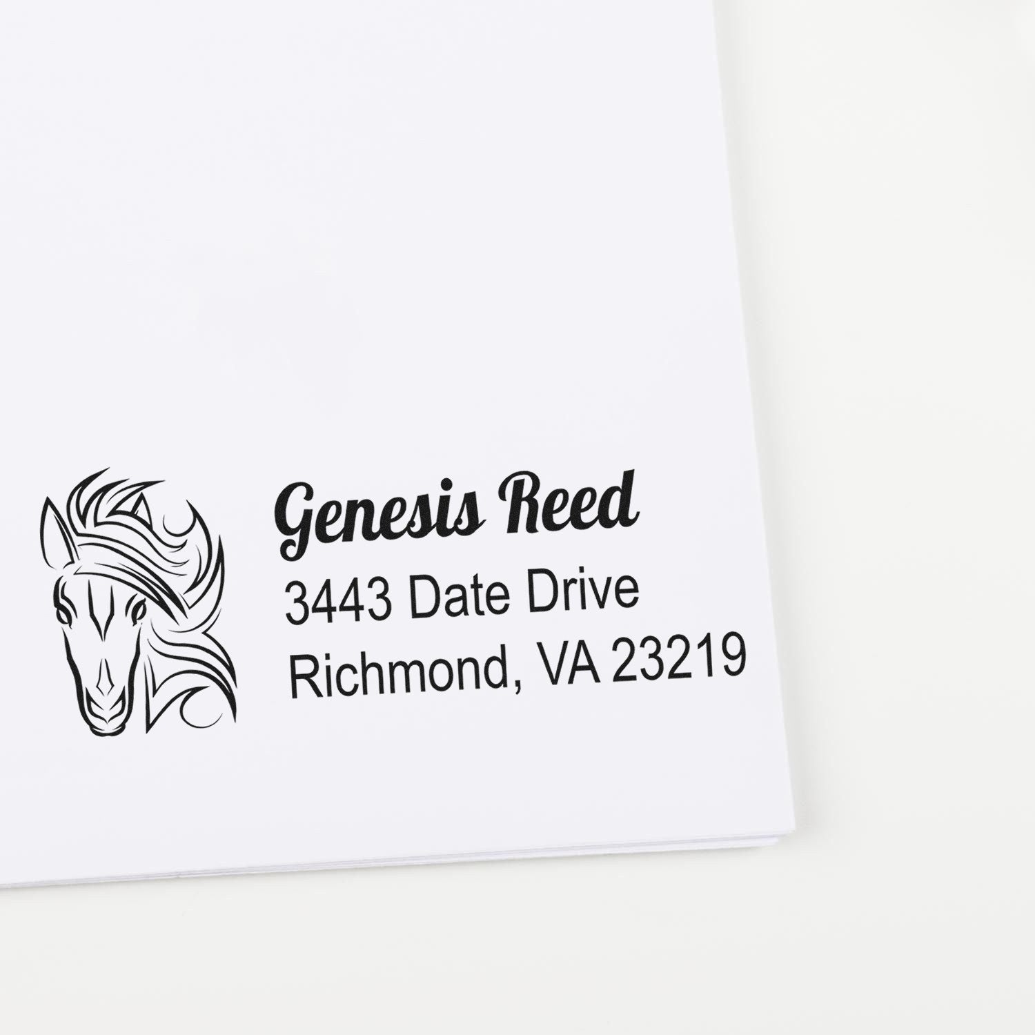 Custom horse logo return address rubber stamp for Genesis Reed, 3443 Date Drive, Richmond, VA 23219.