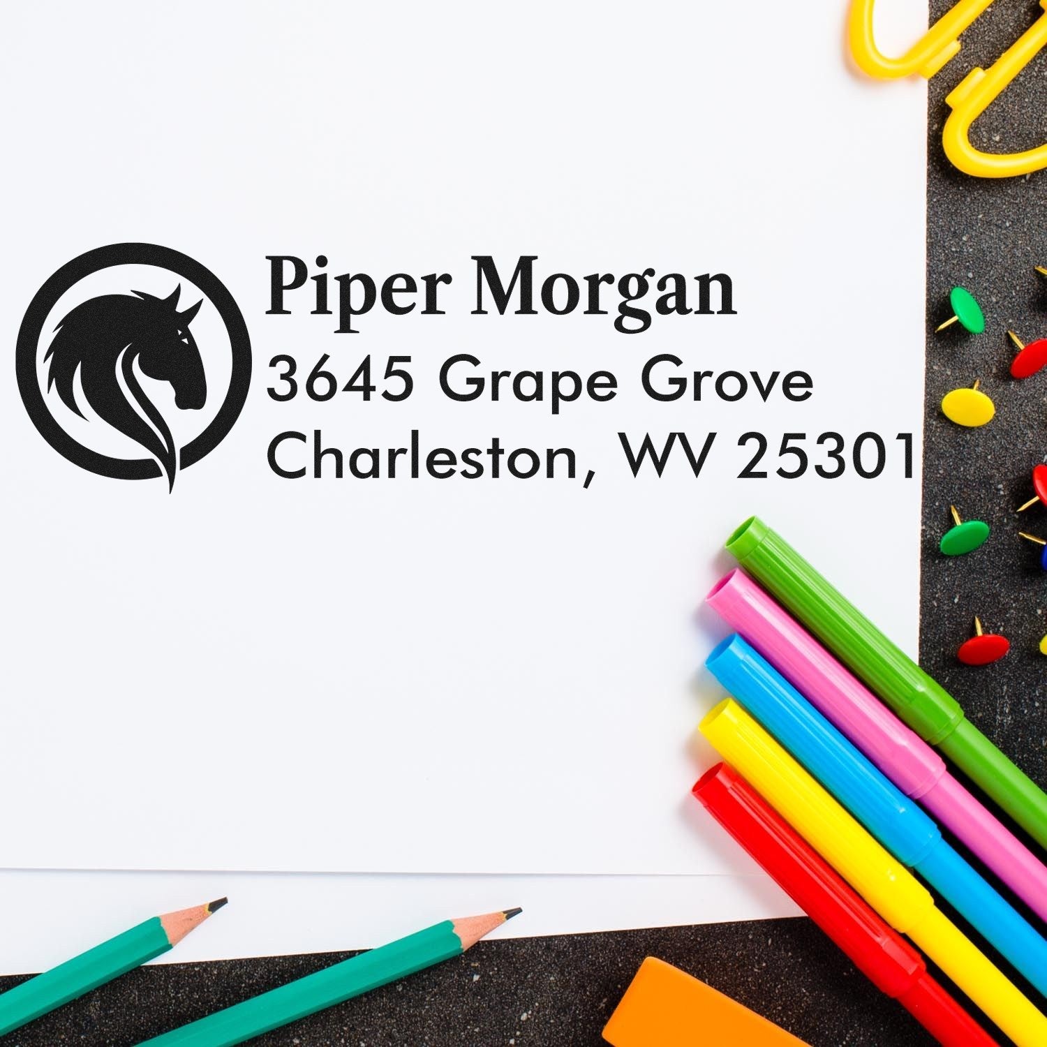 Custom rubber address stamp with horse logo and Piper Morgan, Charleston, WV 25301