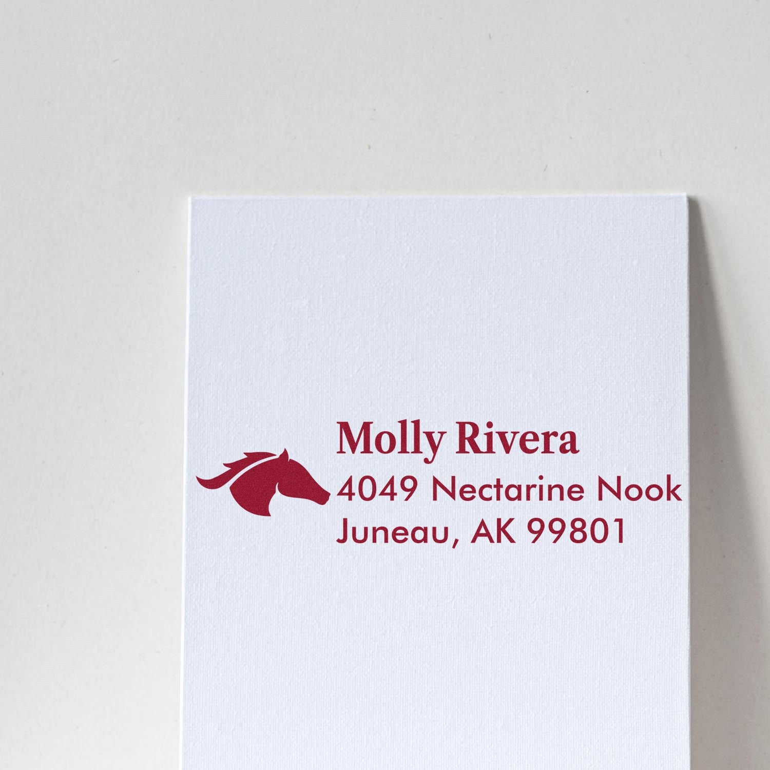 Custom horse logo rubber address stamp for Molly Rivera, Juneau, AK 99801