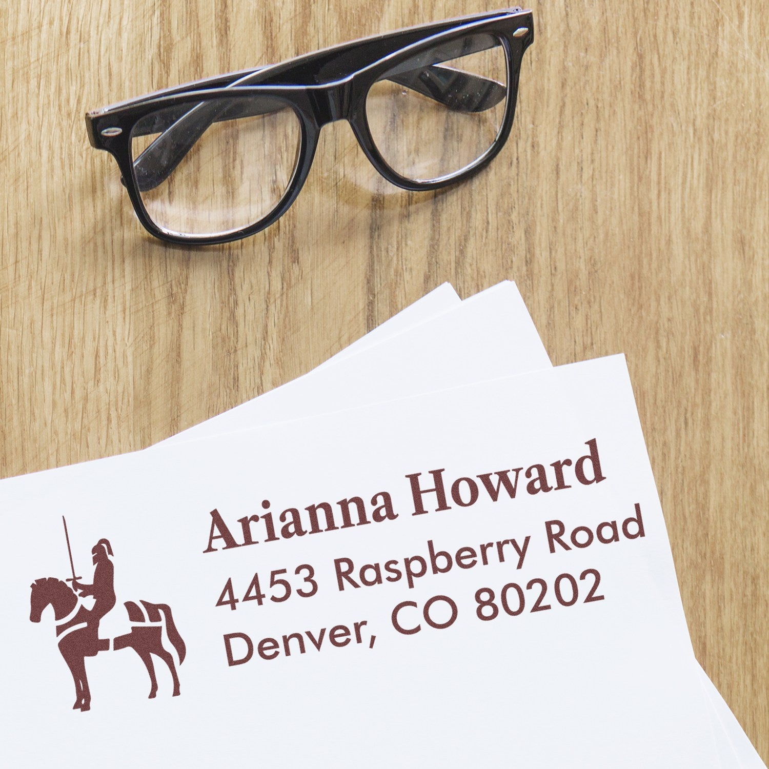 Personalized address rubber stamp with horse rider design for Arianna Howard, Denver, CO.