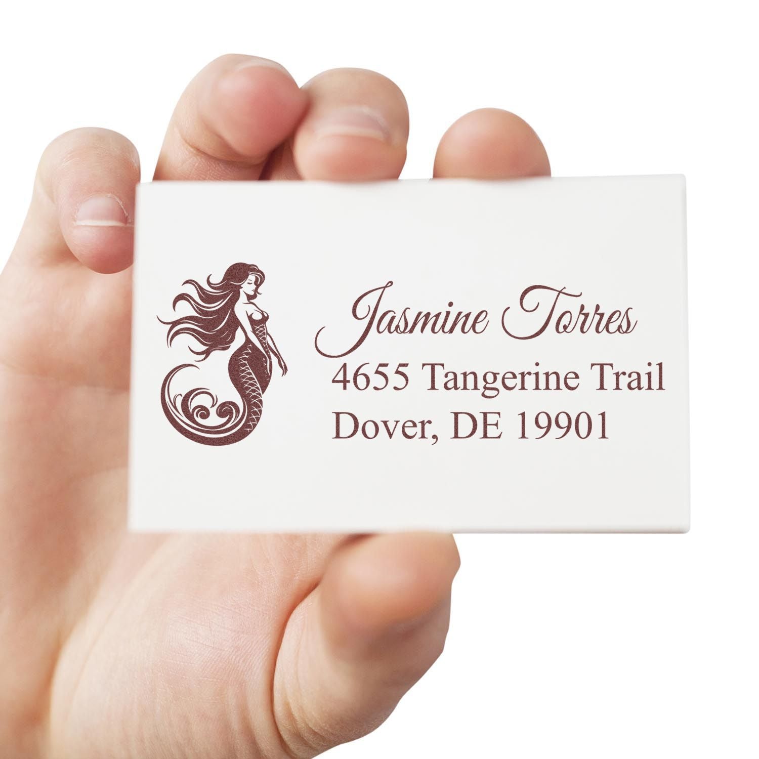Custom mermaid address rubber stamp for business branding and mailing, showing name and Dover, DE address.