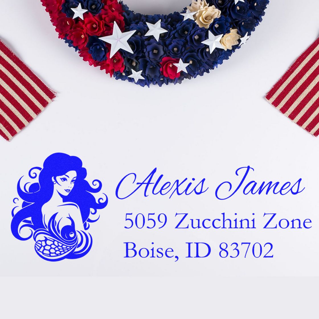Personalized return address rubber stamp with mermaid logo for Alexis James, Boise, ID 83702.