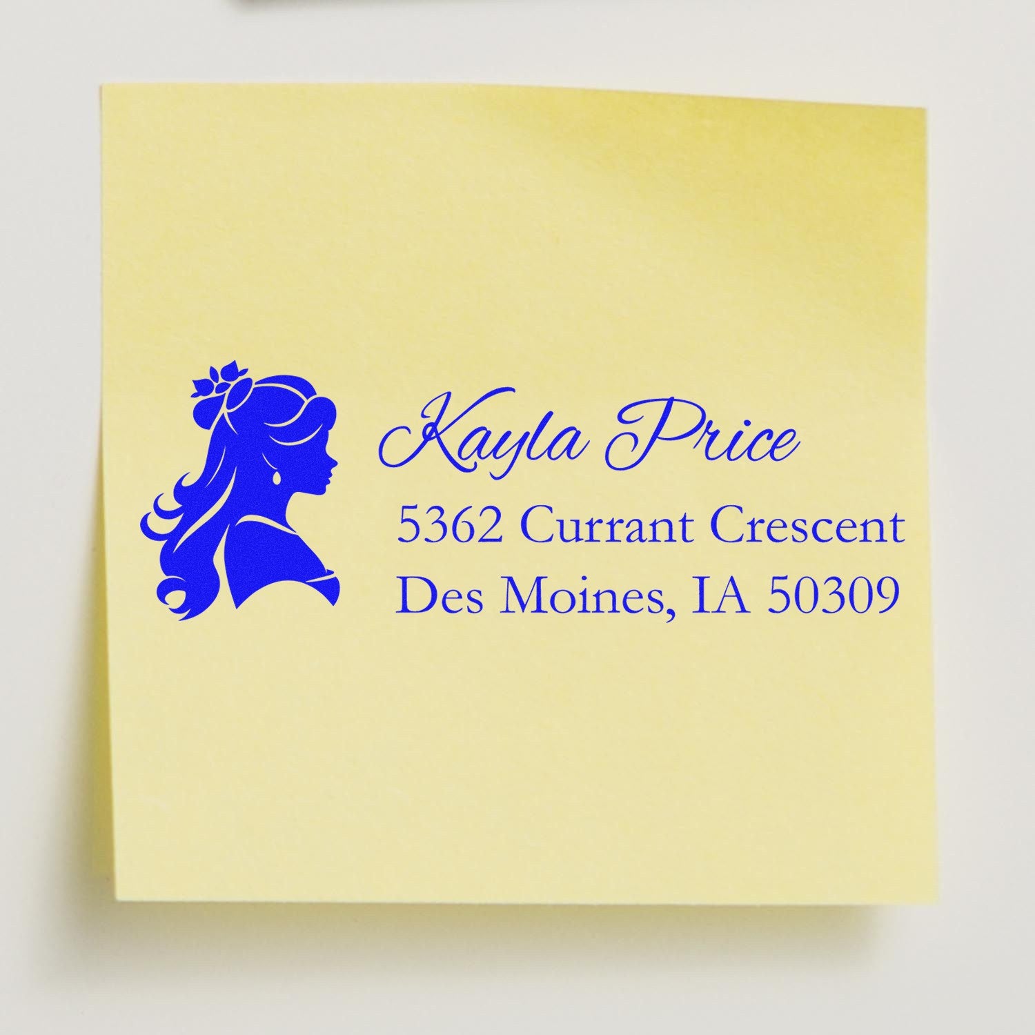 Custom address rubber stamp with floral woman silhouette, featuring Kayla Price return address in Des Moines, IA.