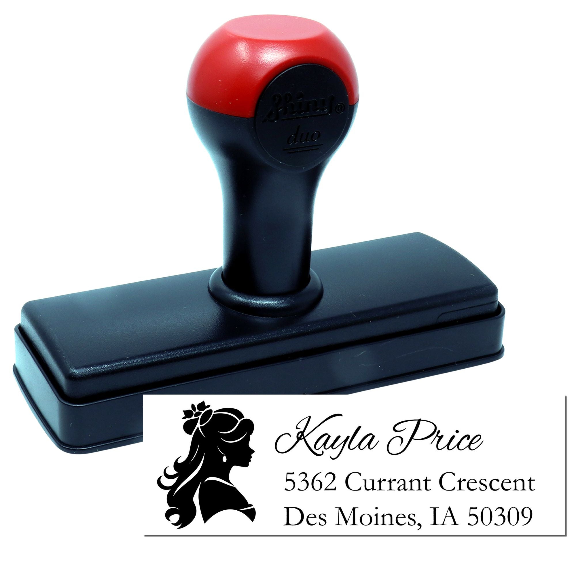 Custom self-inking return address rubber stamp with silhouette logo, name, and mailing address.