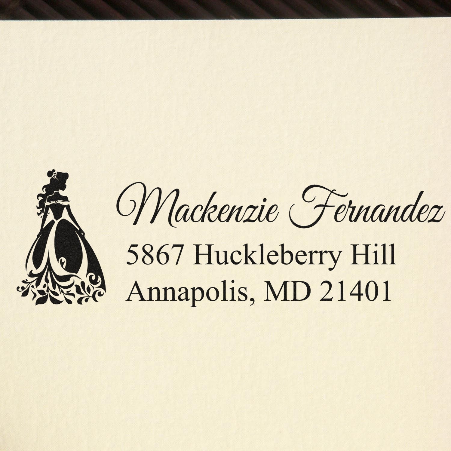 Custom return address rubber stamp with princess silhouette, Mackenzie Fernandez, 5867 Huckleberry Hill, Annapolis, MD.