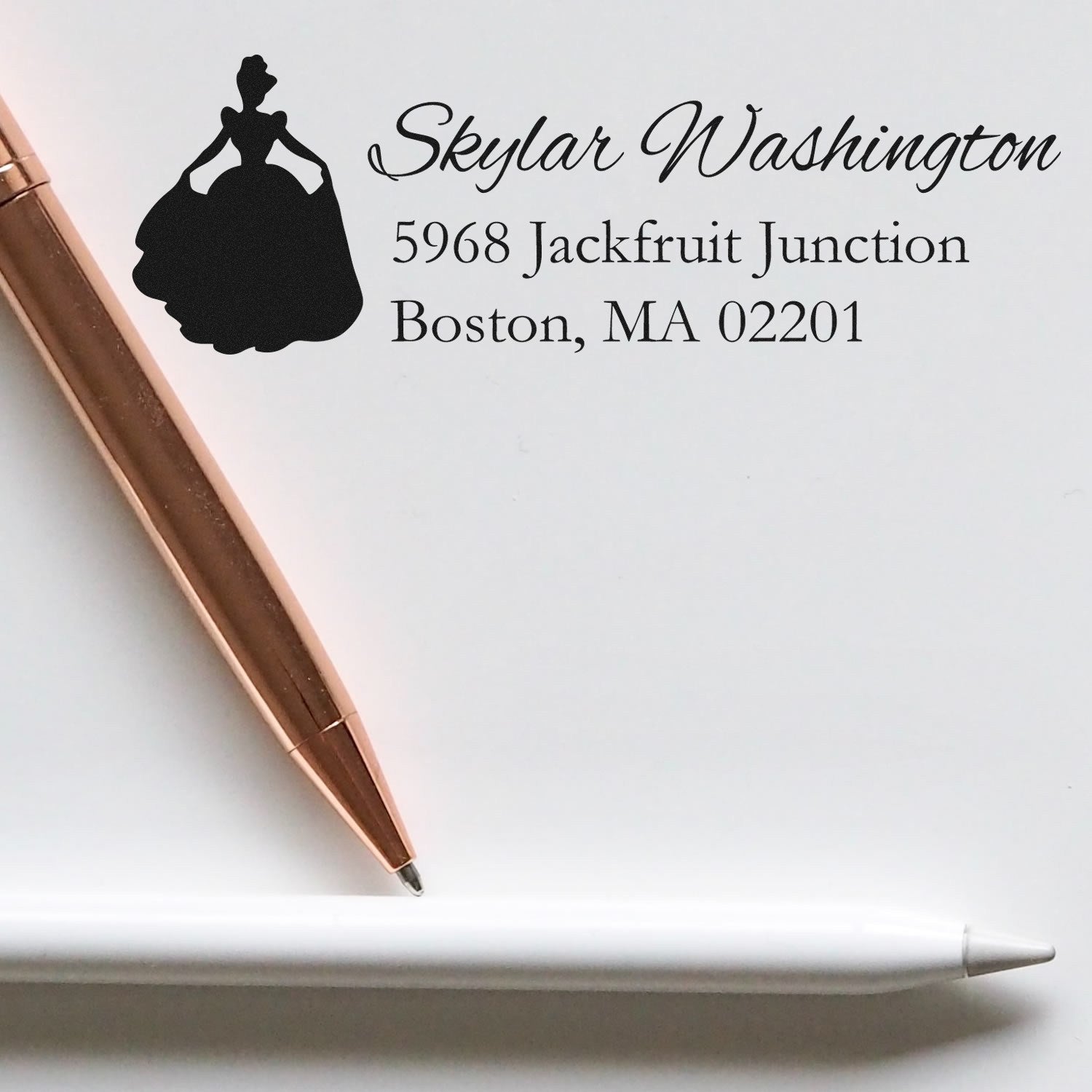 Custom rubber stamp with princess silhouette and personalized return address for Skylar Washington, Boston, MA 02201.