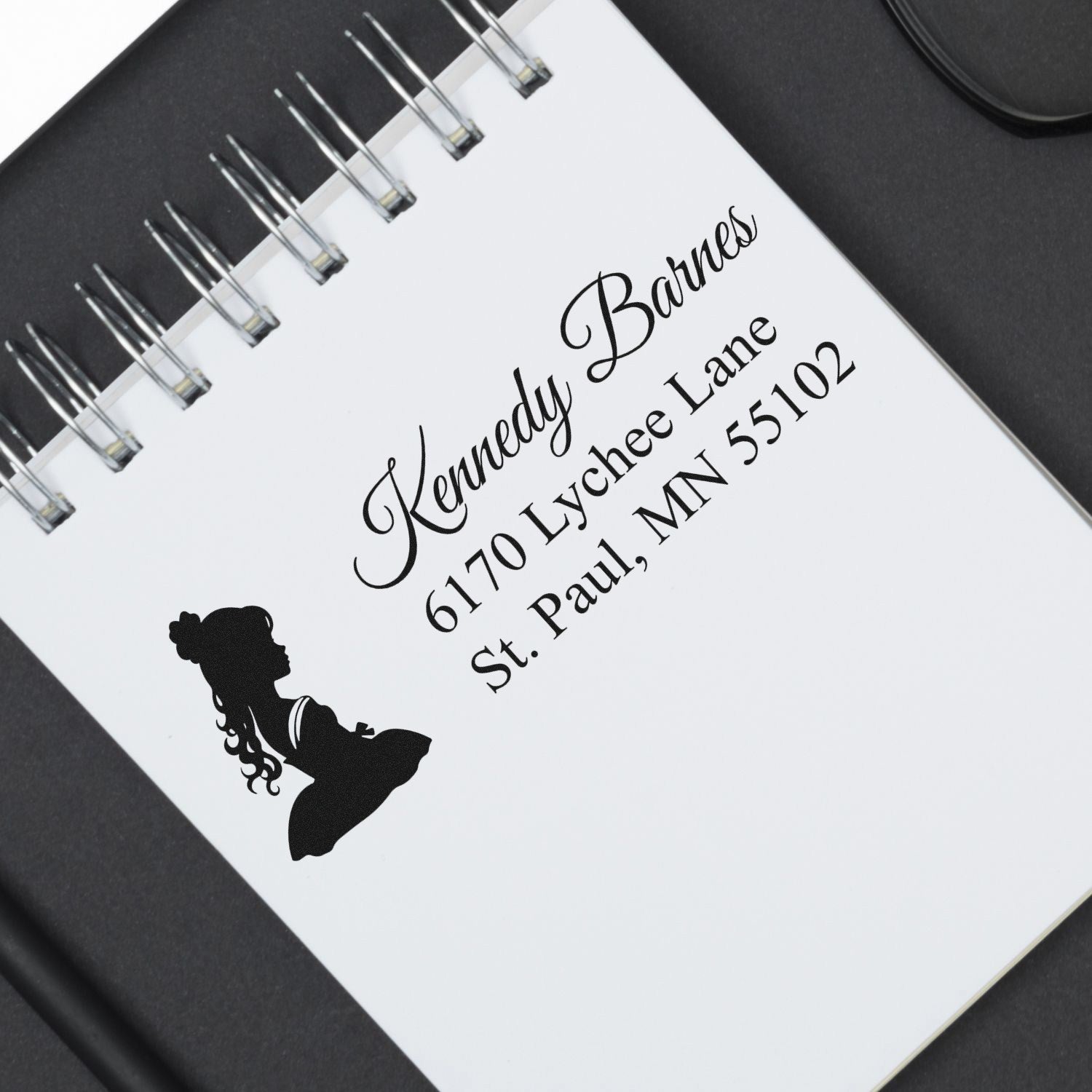 Custom address rubber stamp with girl silhouette for personalized wedding invitations and envelope sealing.