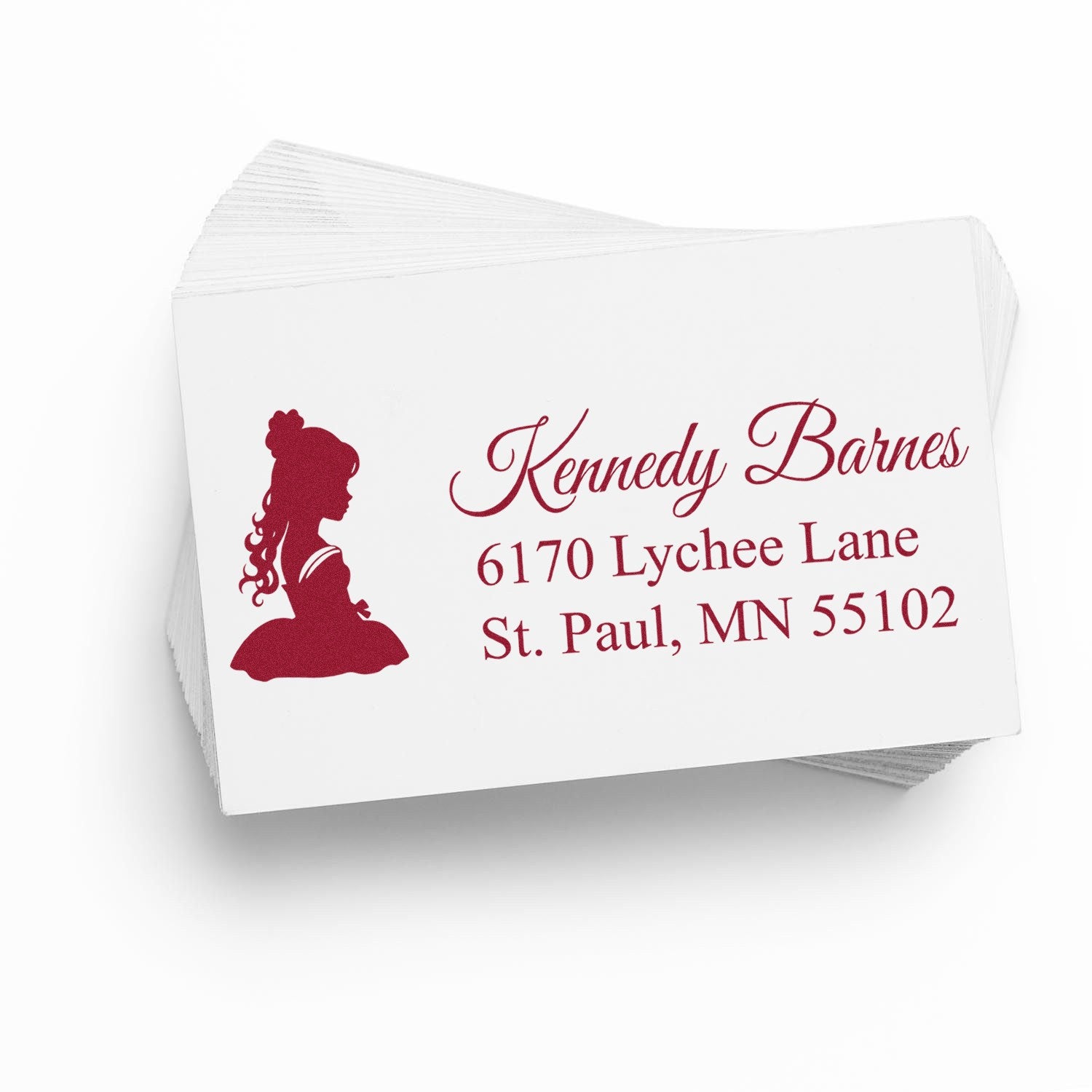 Custom return address rubber stamp with woman silhouette and burgundy name and address for mailing.