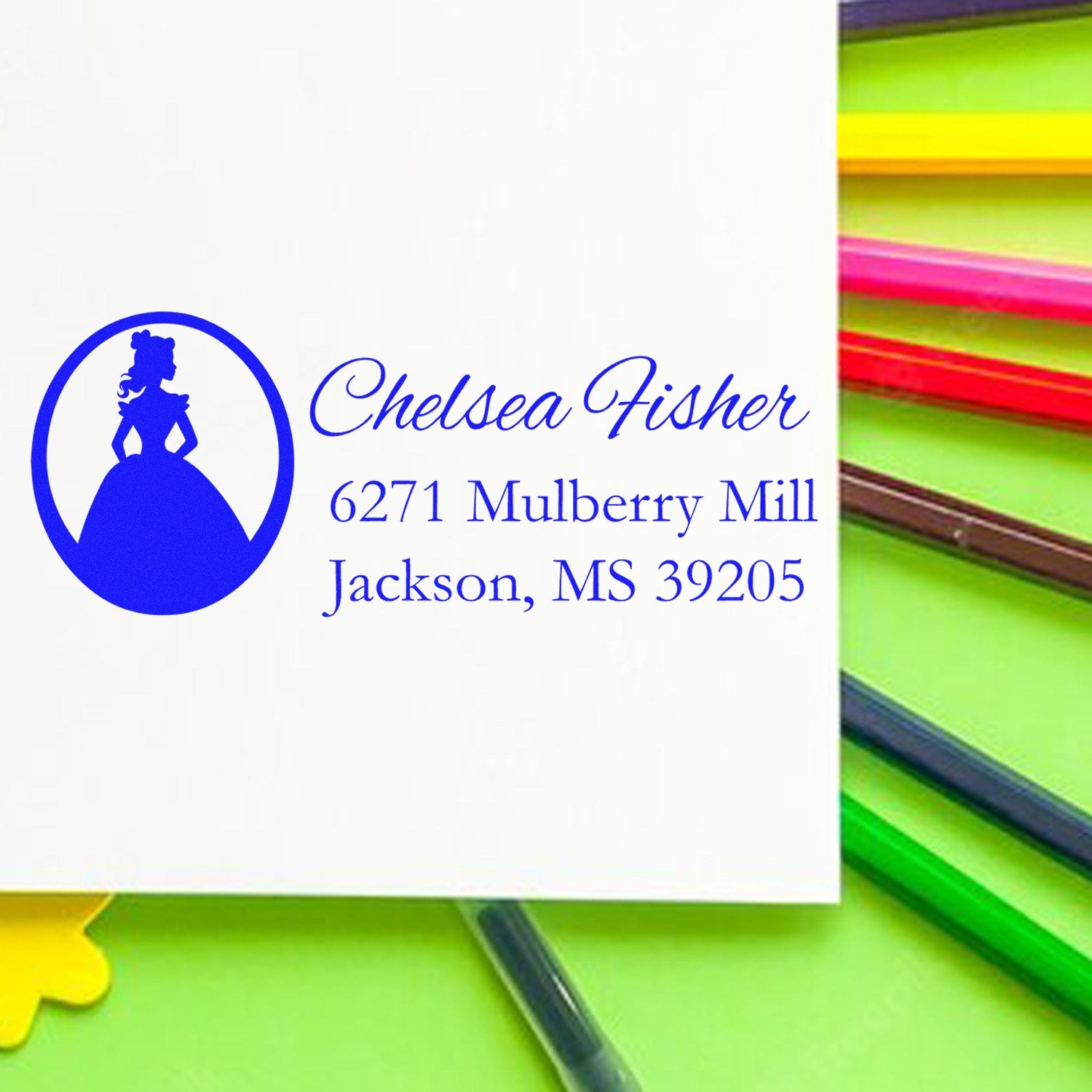 Custom address rubber stamp with princess silhouette and blue imprint for Chelsea Fisher, Jackson, MS 39205.