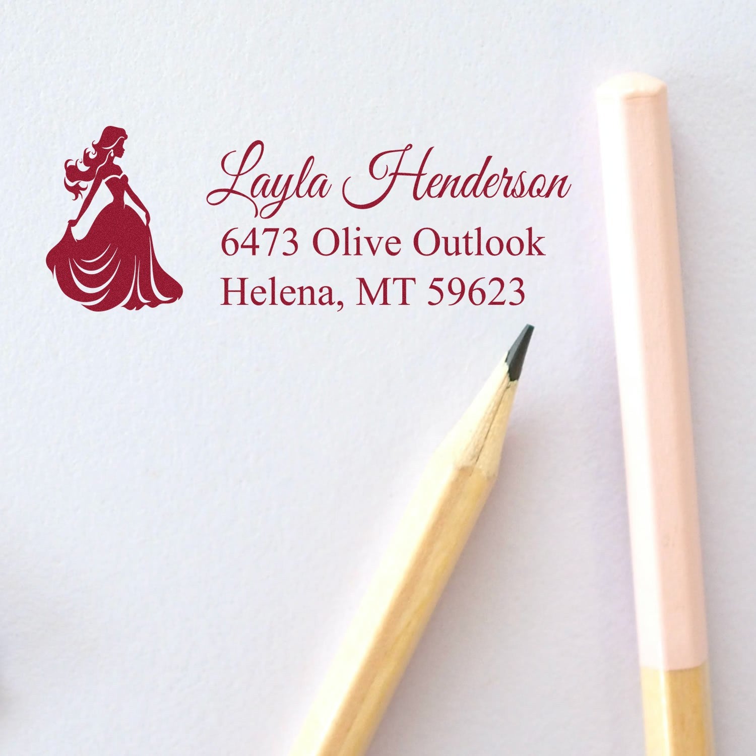 Personalized custom return address rubber stamp with woman silhouette for Layla Henderson, Helena, MT 59623