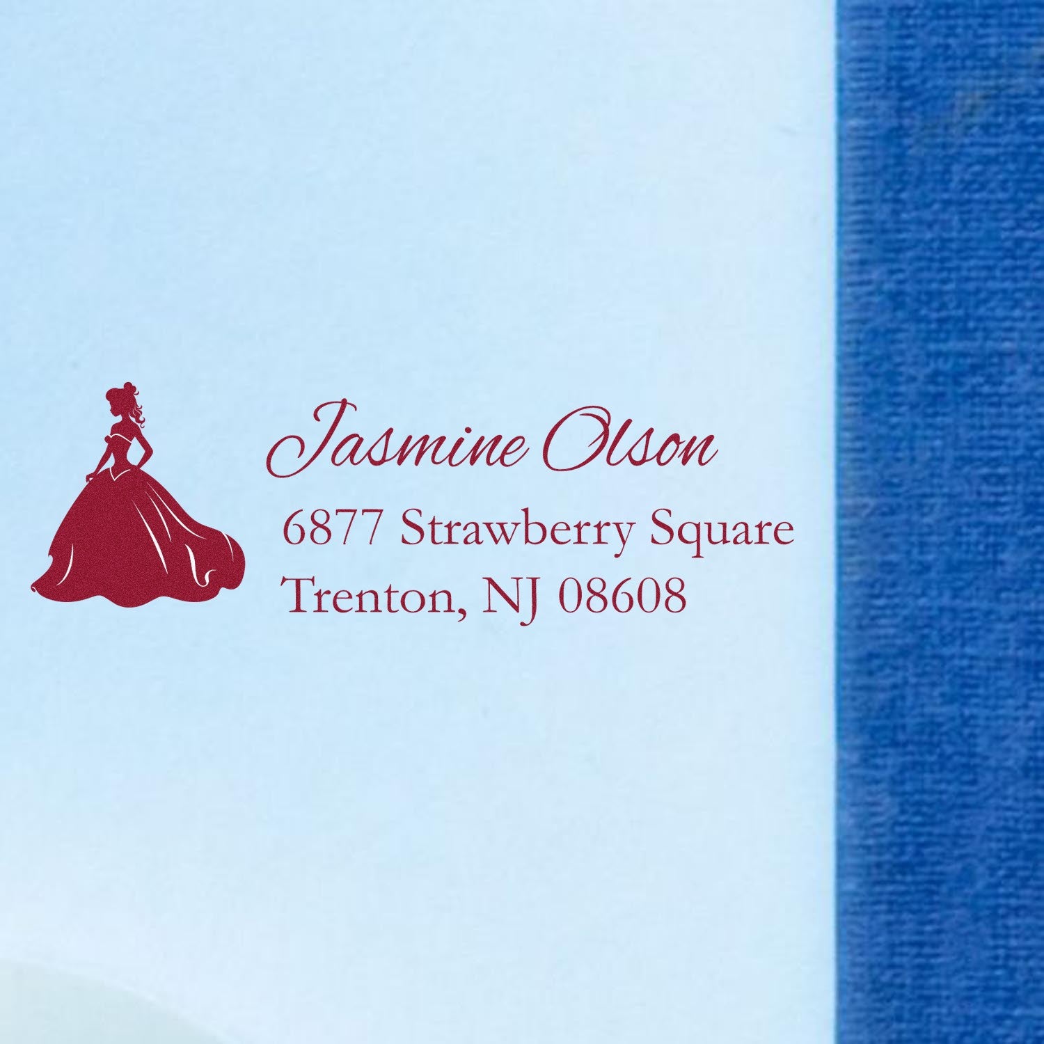 Custom address rubber stamp with princess silhouette for Jasmine Olson, Trenton NJ, in red ink on white paper