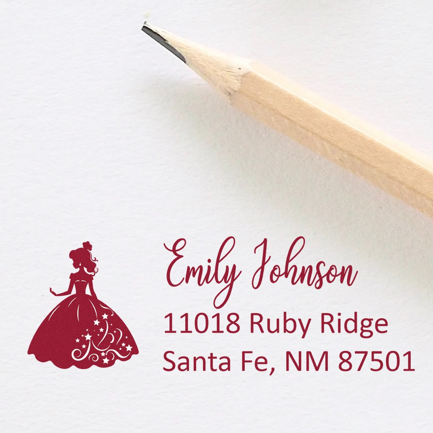 Personalized princess return address rubber stamp for Emily Johnson, Santa Fe, NM, with decorative dress silhouette.