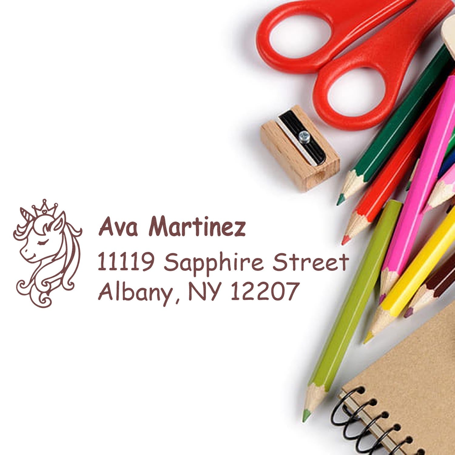 Custom unicorn address rubber stamp for Ava Martinez, Albany NY, with name and return address for school or mail labeling.