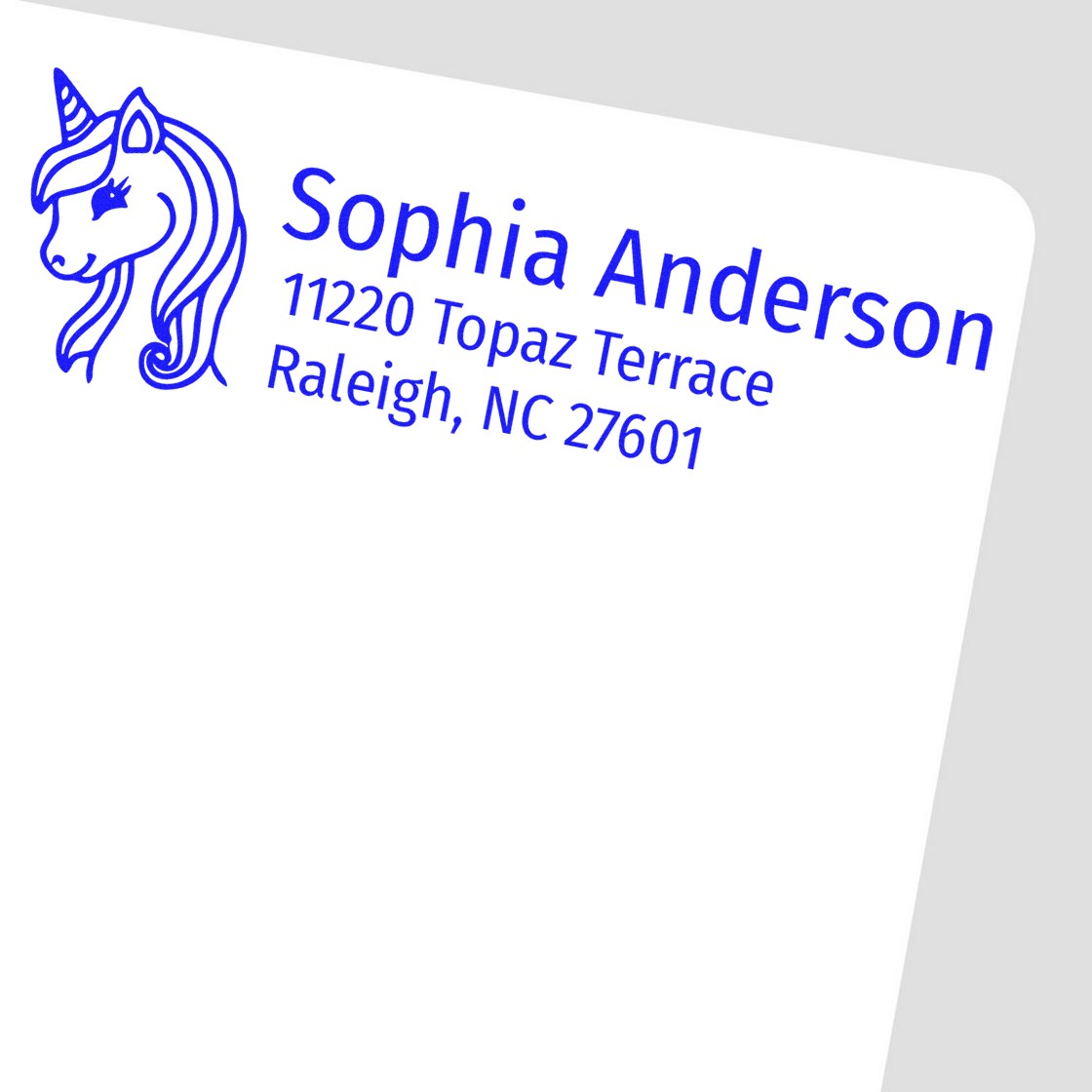 Custom unicorn return address rubber stamp for Sophia Anderson, 11220 Topaz Terrace, Raleigh, NC 27601.