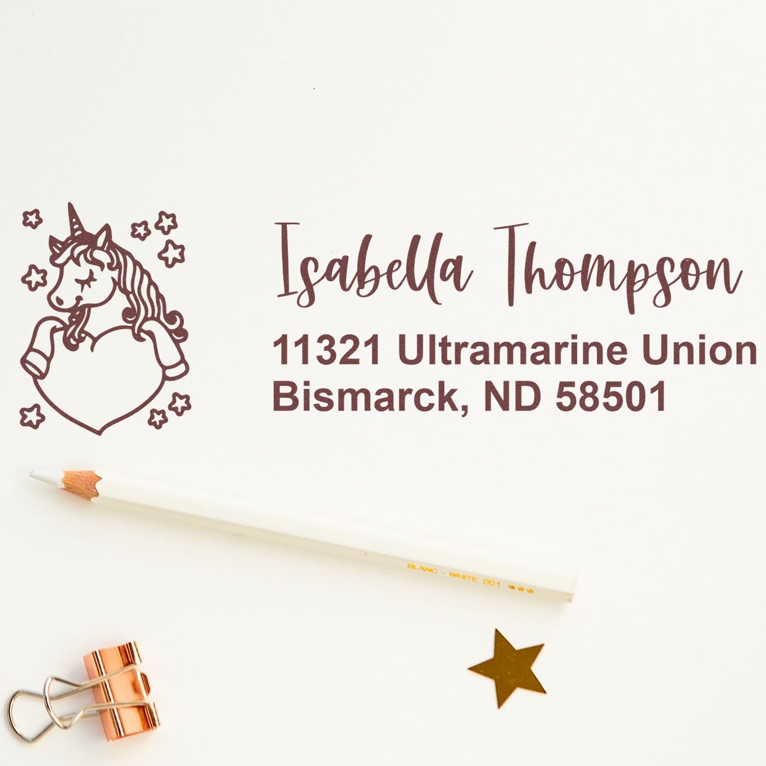 Personalized unicorn return address rubber stamp with name and Bismarck, ND address for custom stationery and mail.