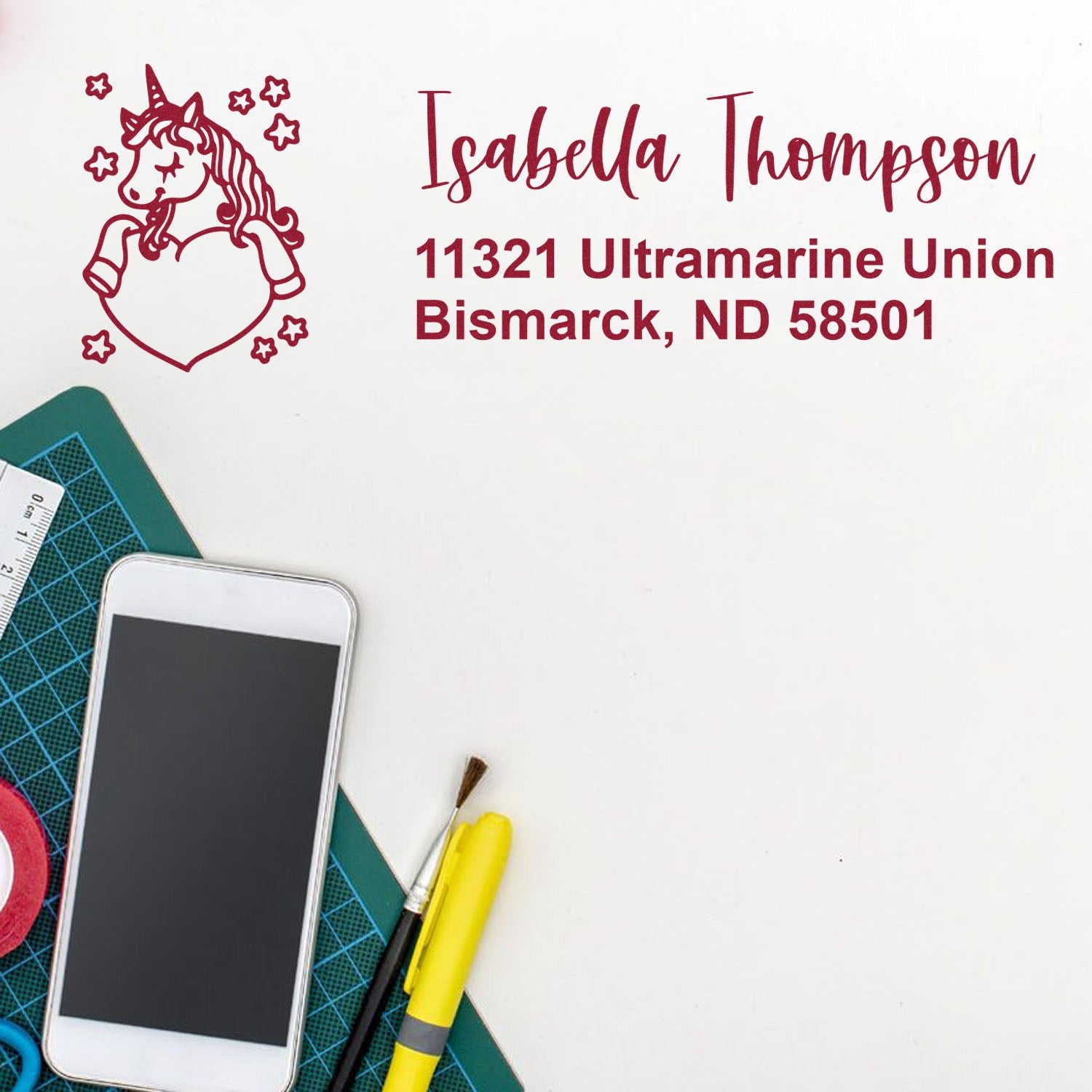 Custom unicorn return address rubber stamp with name Isabella Thompson and Bismarck, ND address for envelopes and crafts.
