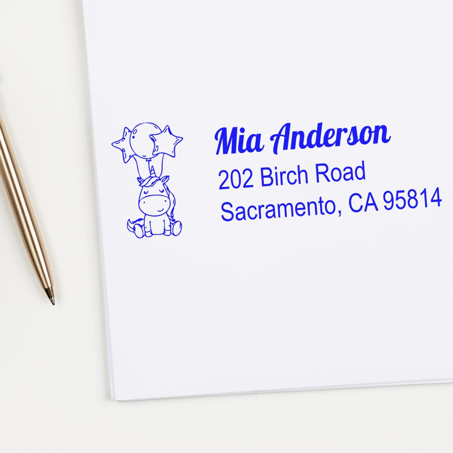 Custom personalized return address rubber stamp with unicorn design for Mia Anderson, Sacramento, CA 95814