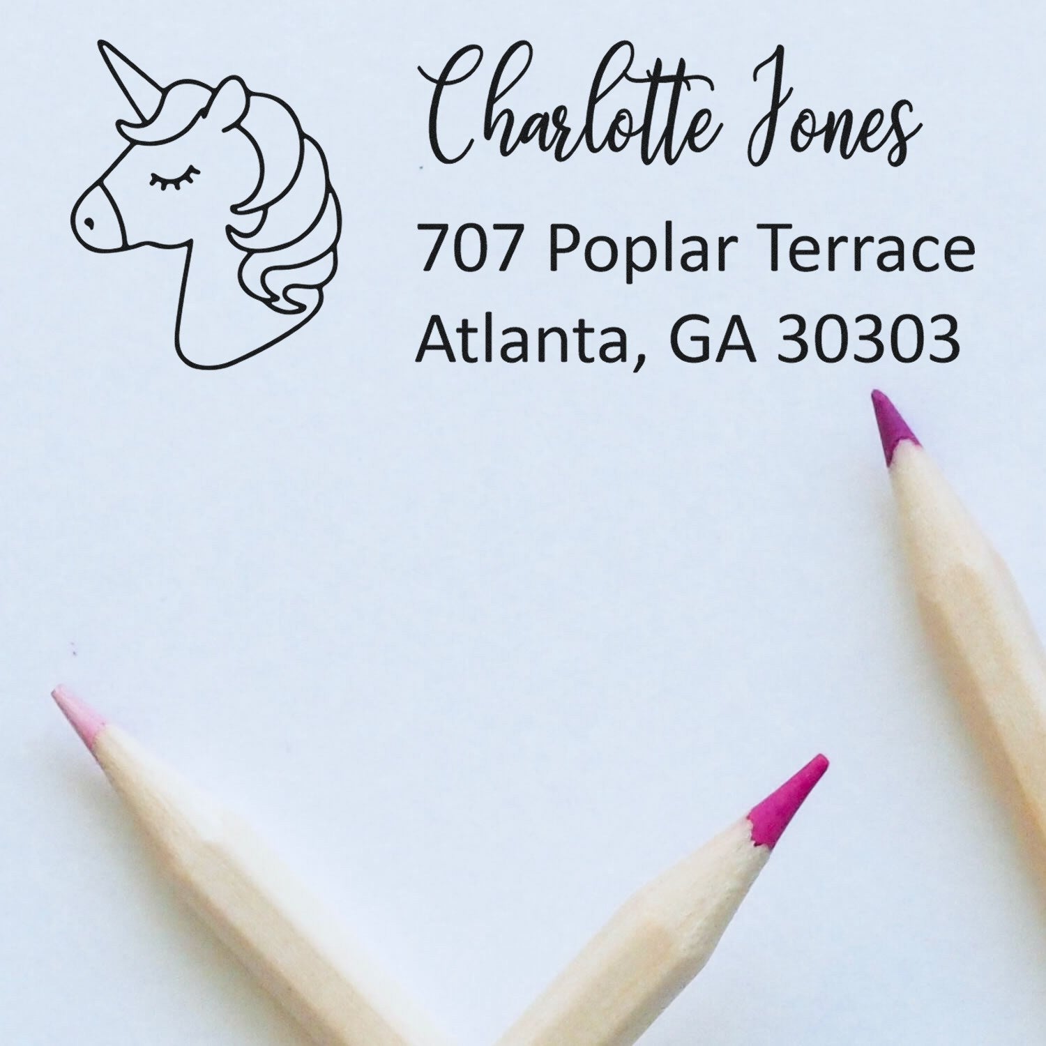 Personalized unicorn return address rubber stamp for Charlotte Jones, 707 Poplar Terrace, Atlanta, GA 30303