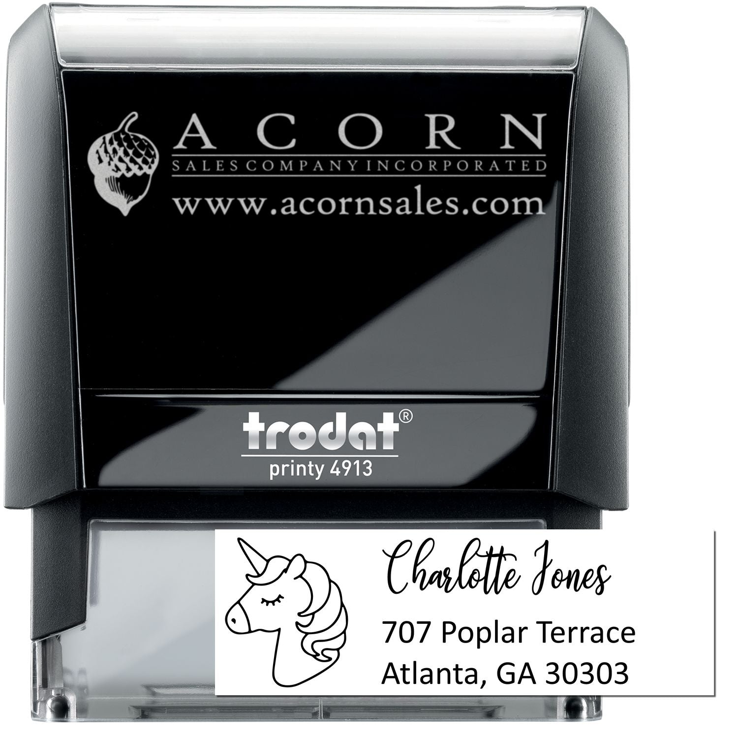 Custom unicorn address rubber stamp for Charlotte Jones, Atlanta GA, shown on a Trodat Printy 4913 self-inking stamp.