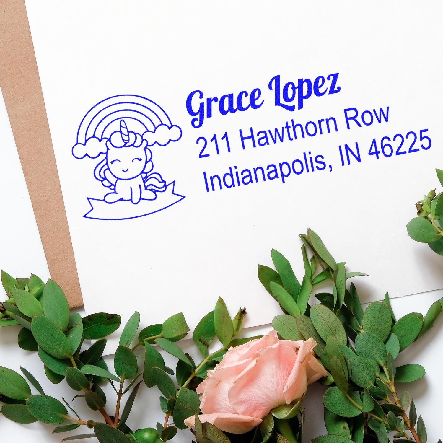 Custom unicorn return address rubber stamp with rainbow design, featuring Grace Lopez name and Indianapolis mailing address.