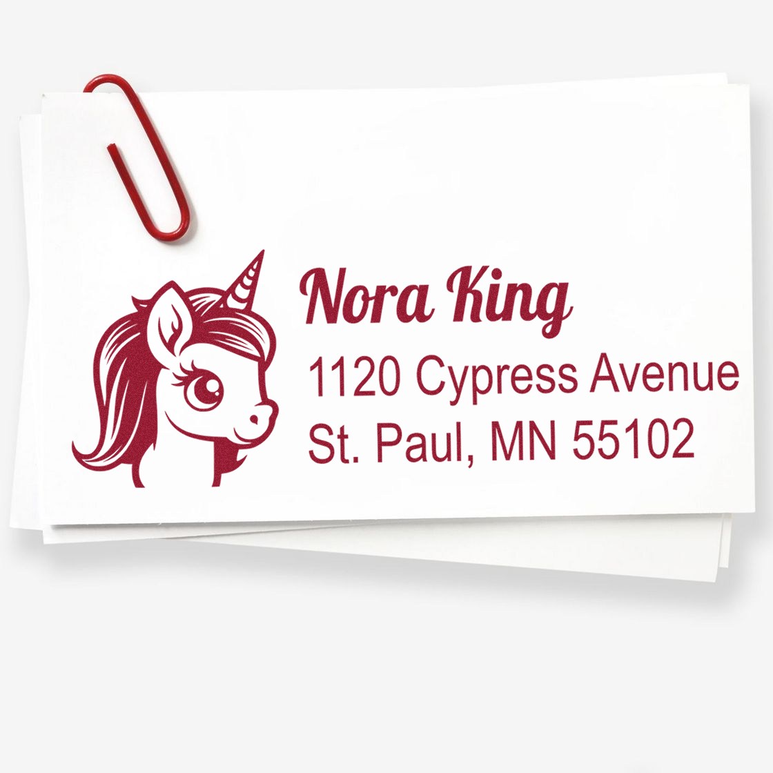 Custom unicorn return address rubber stamp for Nora King, St. Paul, MN mailing labels.