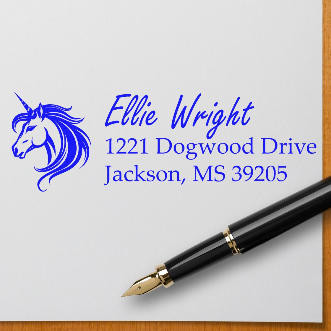 Personalized unicorn return address rubber stamp for Ellie Wright, 1221 Dogwood Drive, Jackson, MS 39205.