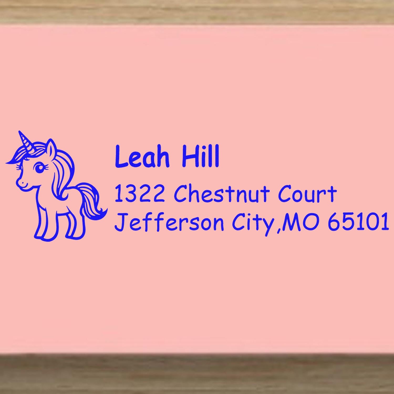 Custom unicorn return address rubber stamp for Leah Hill, Jefferson City, MO 65101