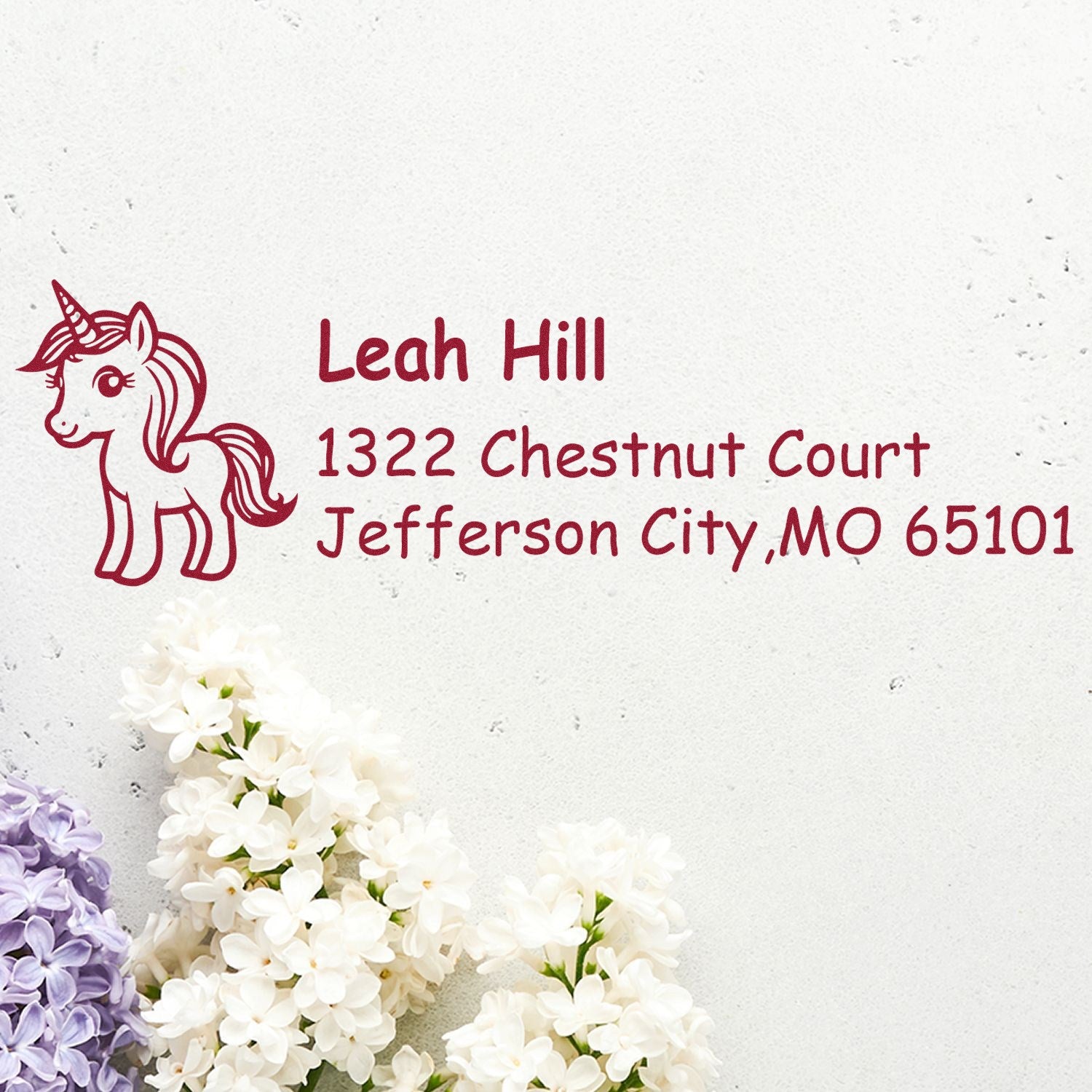 Personalized unicorn return address rubber stamp for Leah Hill, 1322 Chestnut Court, Jefferson City, MO 65101.