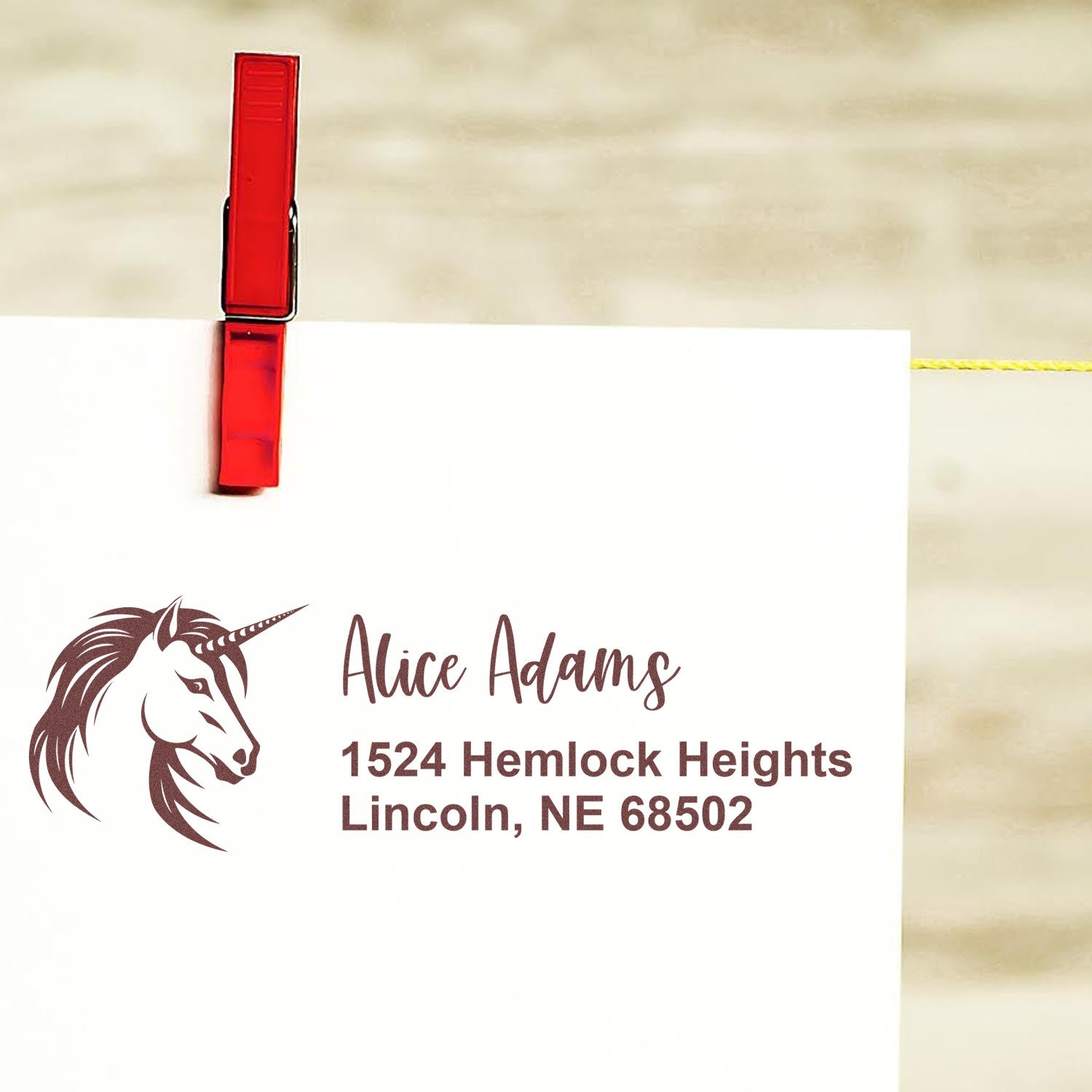 Custom unicorn return address rubber stamp for Alice Adams, 1524 Hemlock Heights, Lincoln, NE 68502.