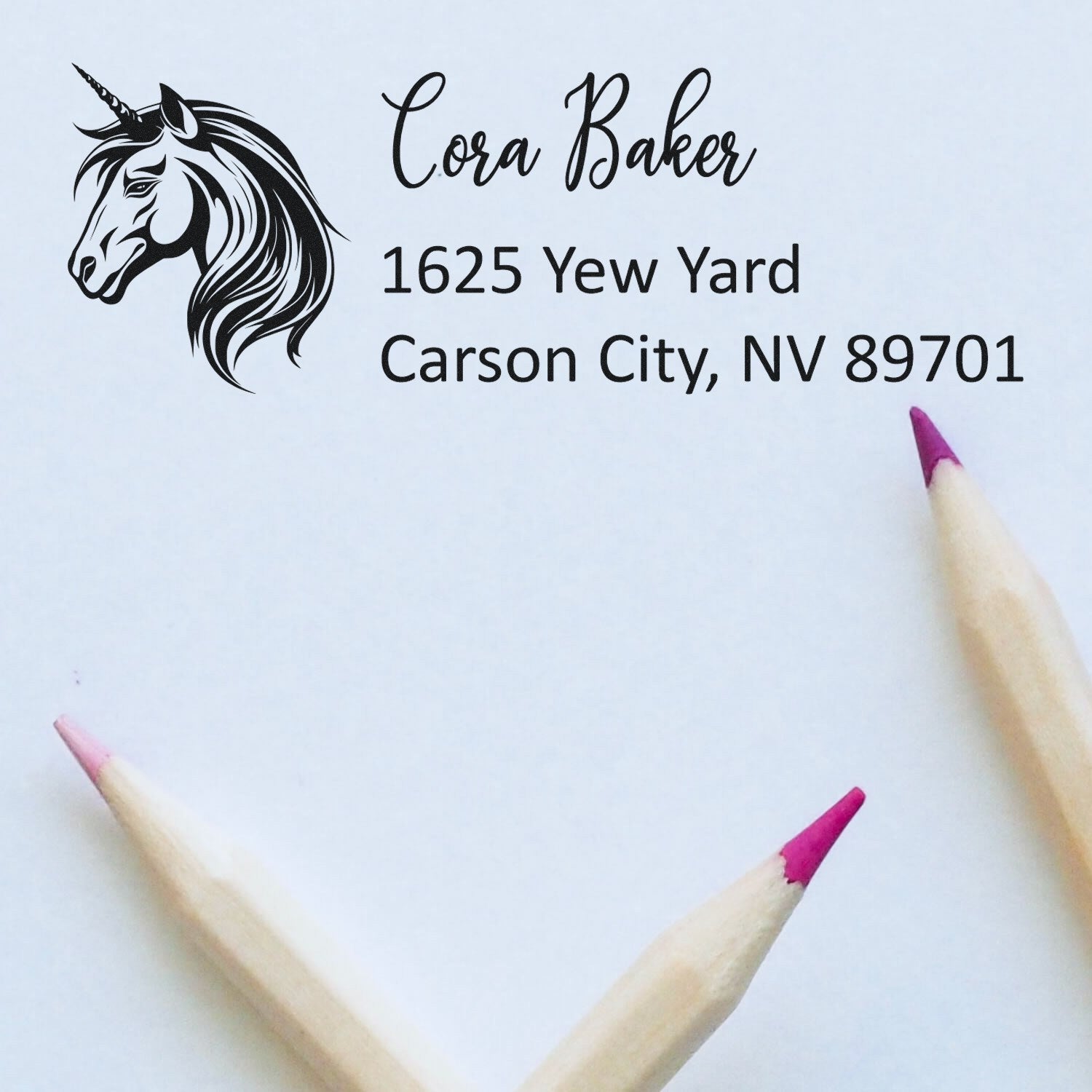Personalized unicorn return address rubber stamp for Cora Baker, 1625 Yew Yard, Carson City, NV 89701.