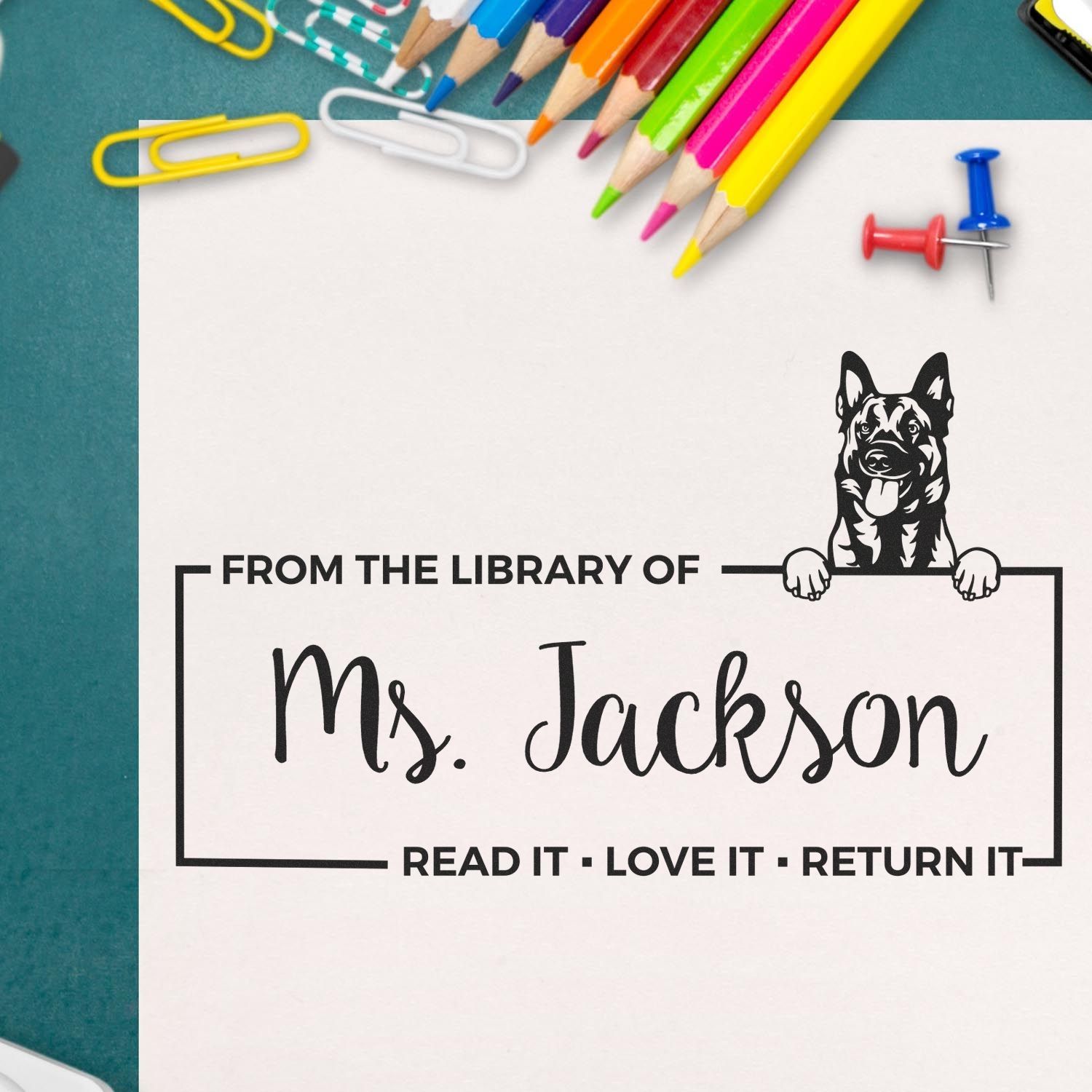 Personalized dog library rubber stamp for Ms. Jackson, with Read it, love it, return it book return label.
