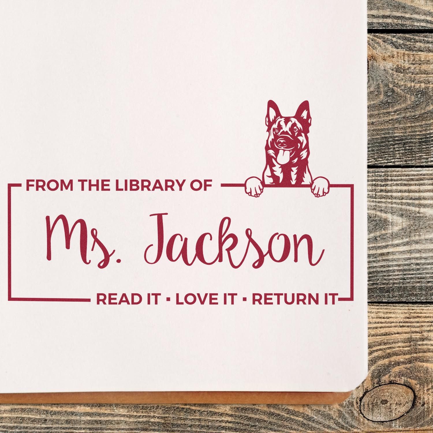 Custom rubber book stamp for Ms. Jackson with dog library design and Read It, Love It, Return It message.