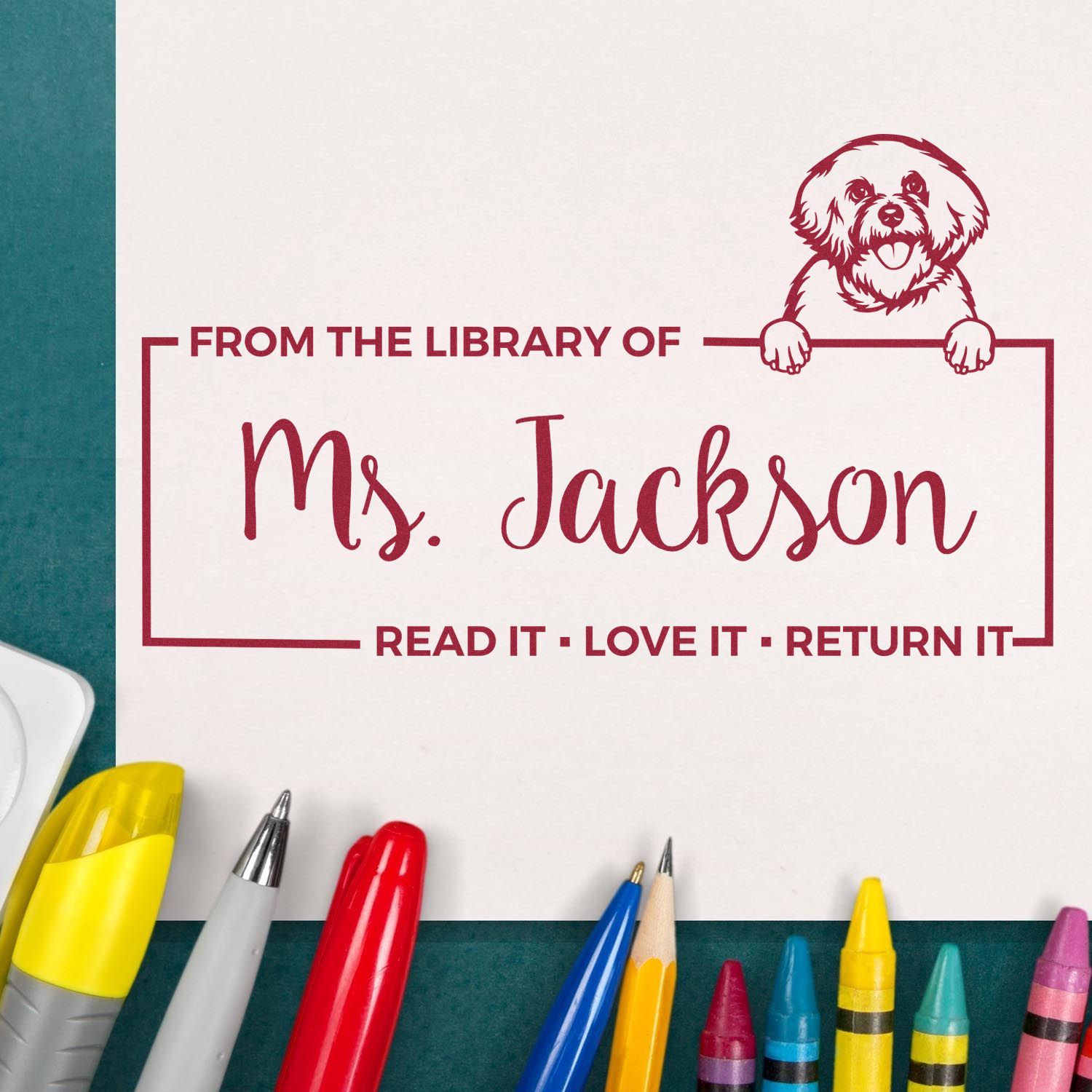 Personalized library rubber stamp for Ms. Jackson with dog art and Read it, love it, return it bookplate.