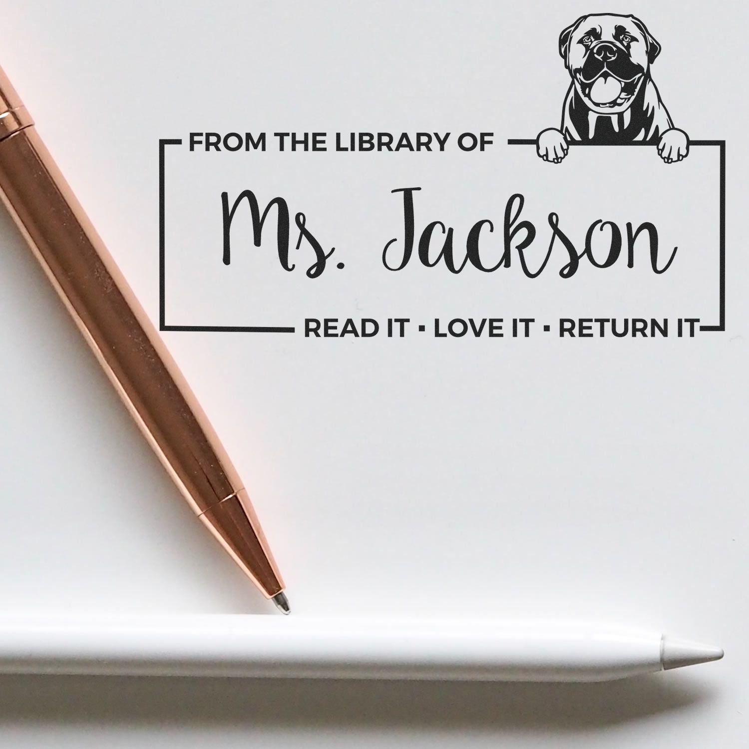 Custom rubber library stamp with dog design, From the Library of Ms. Jackson and Read it, Love it, Return it book return label.
