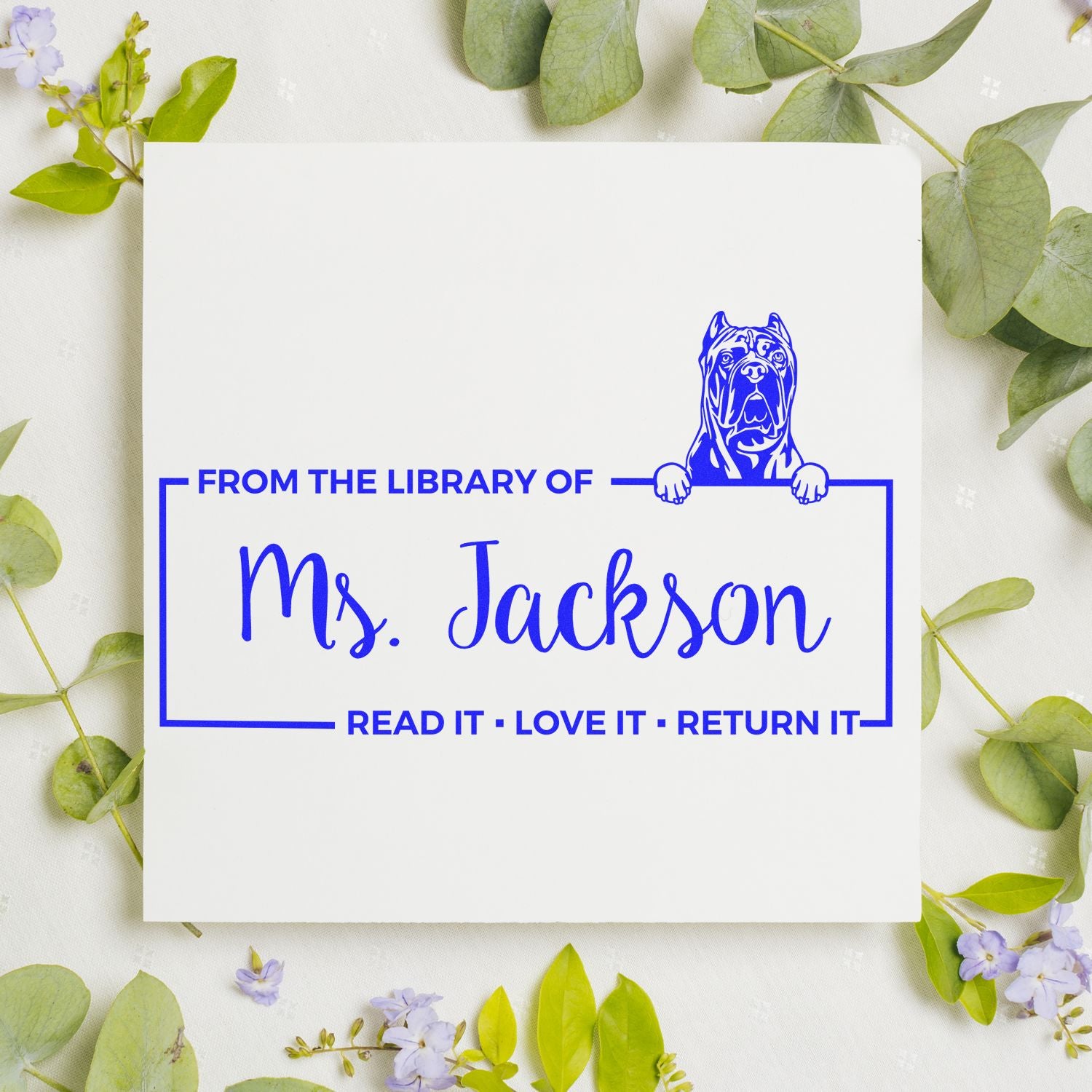 Custom library book return rubber stamp for Ms. Jackson with bulldog and Read it, Love it, Return it message.