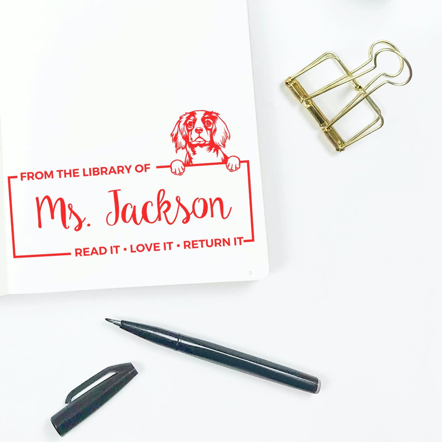 Custom rubber library stamp for Ms. Jackson with dog design, Read it, love it, return it book ownership imprint.