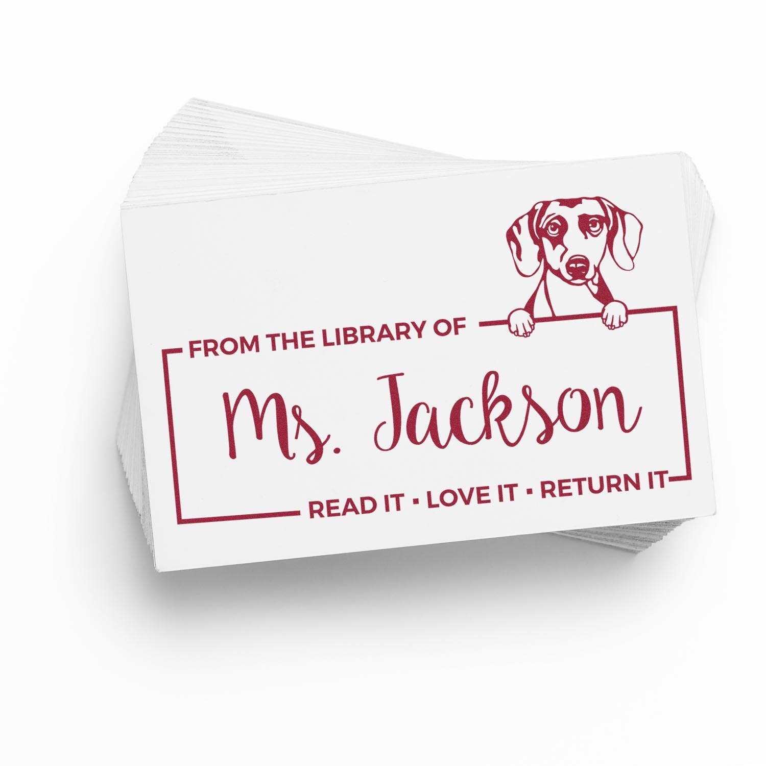 Personalized library rubber stamp for books, reading From the Library of Ms. Jackson with a dog and return reminder.