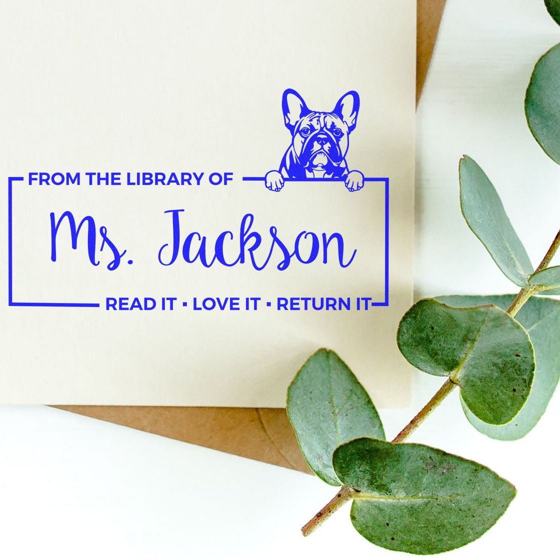 Personalized dog library rubber stamp for Ms. Jackson, with Read it, love it, return it book ownership design.