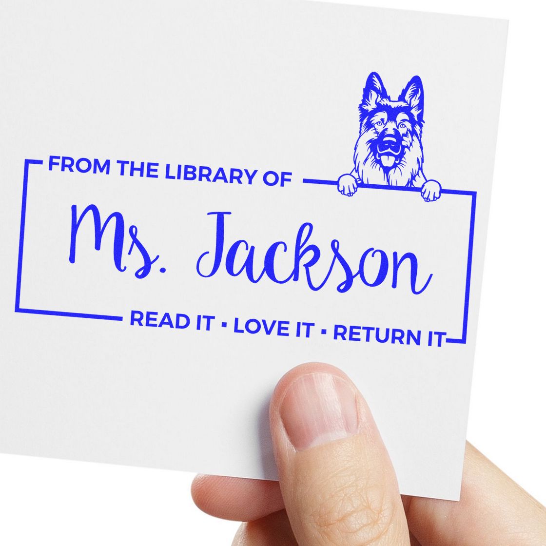 Personalized library book rubber stamp for Ms. Jackson with dog design and Read it, Love it, Return it return label.
