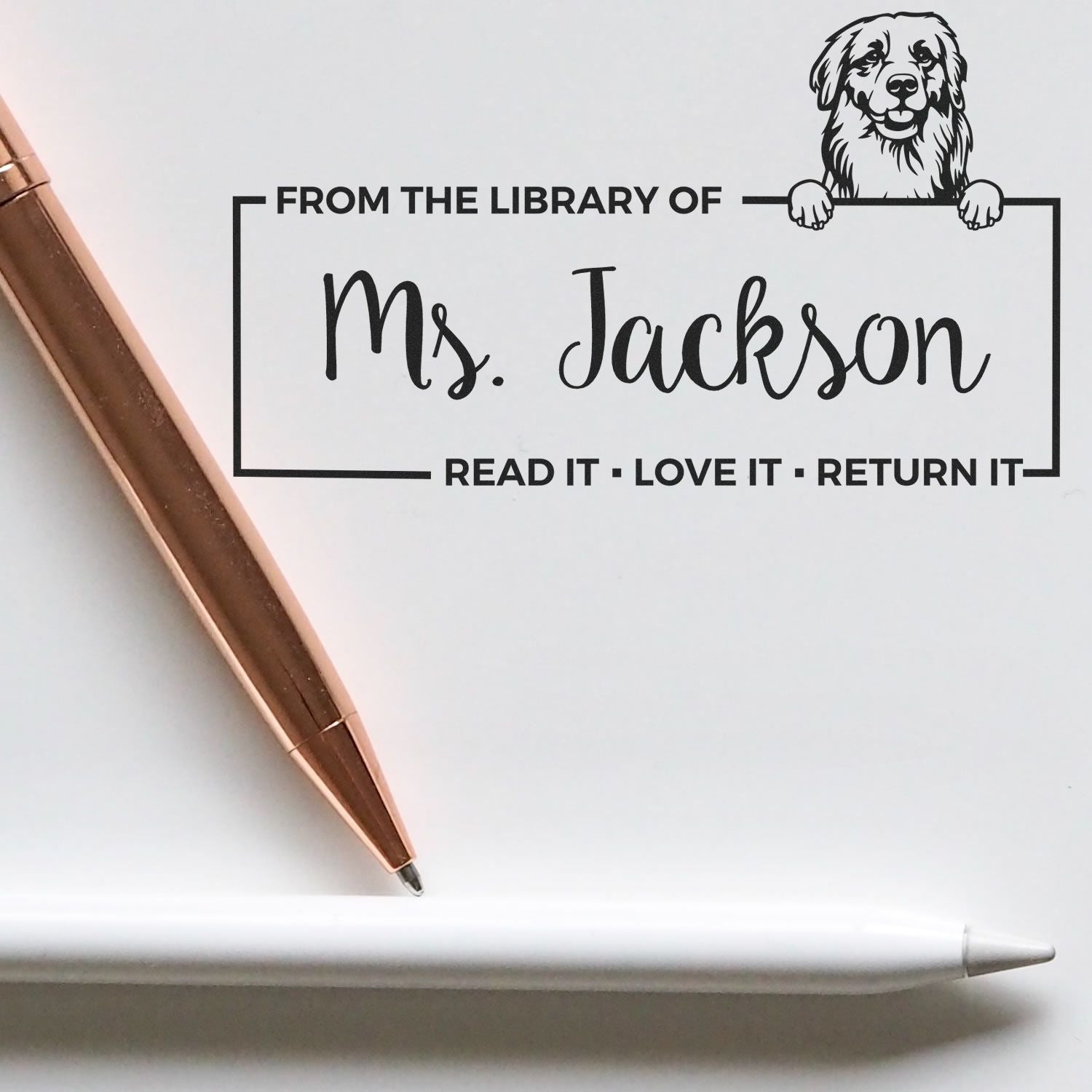 Personalized book stamp for Ms. Jackson with dog design and Read it, Love it, Return it library text.