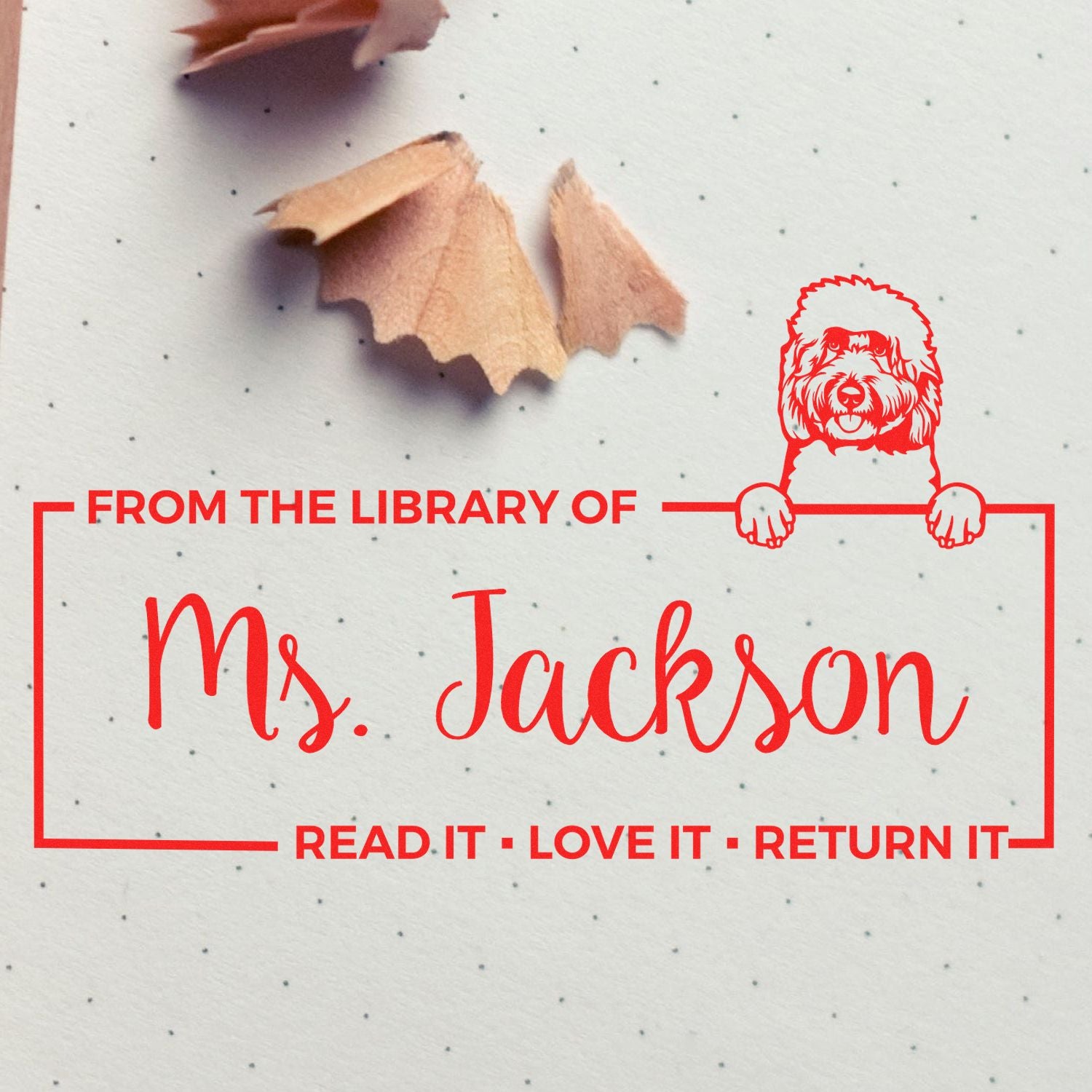 Custom library rubber stamp for books reading From the Library of Ms. Jackson, Read It, Love It, Return It with dog illustration.