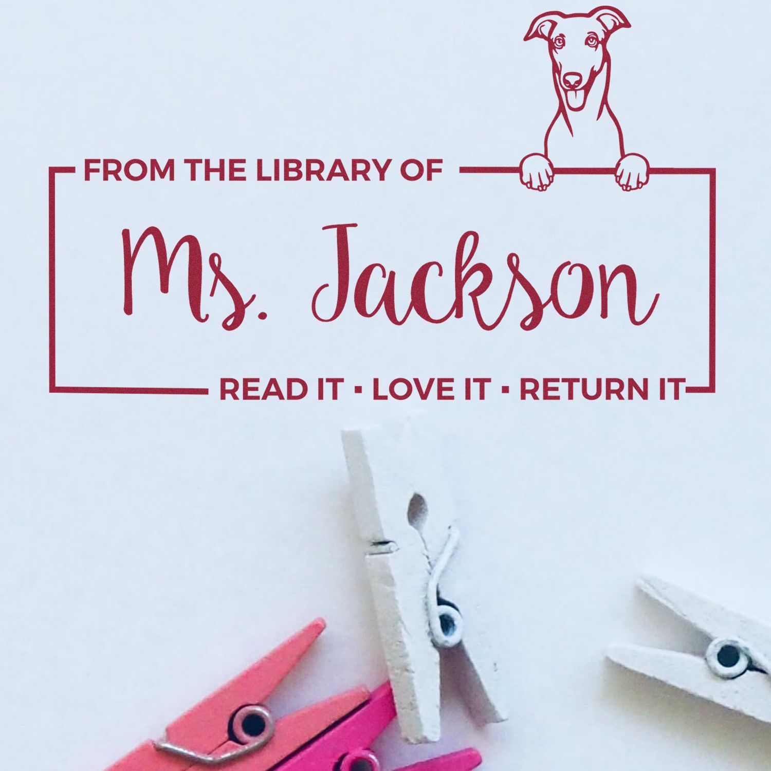 Personalized rubber stamp for books with dog graphic: From the Library of Ms. Jackson and Read It, Love It, Return It.